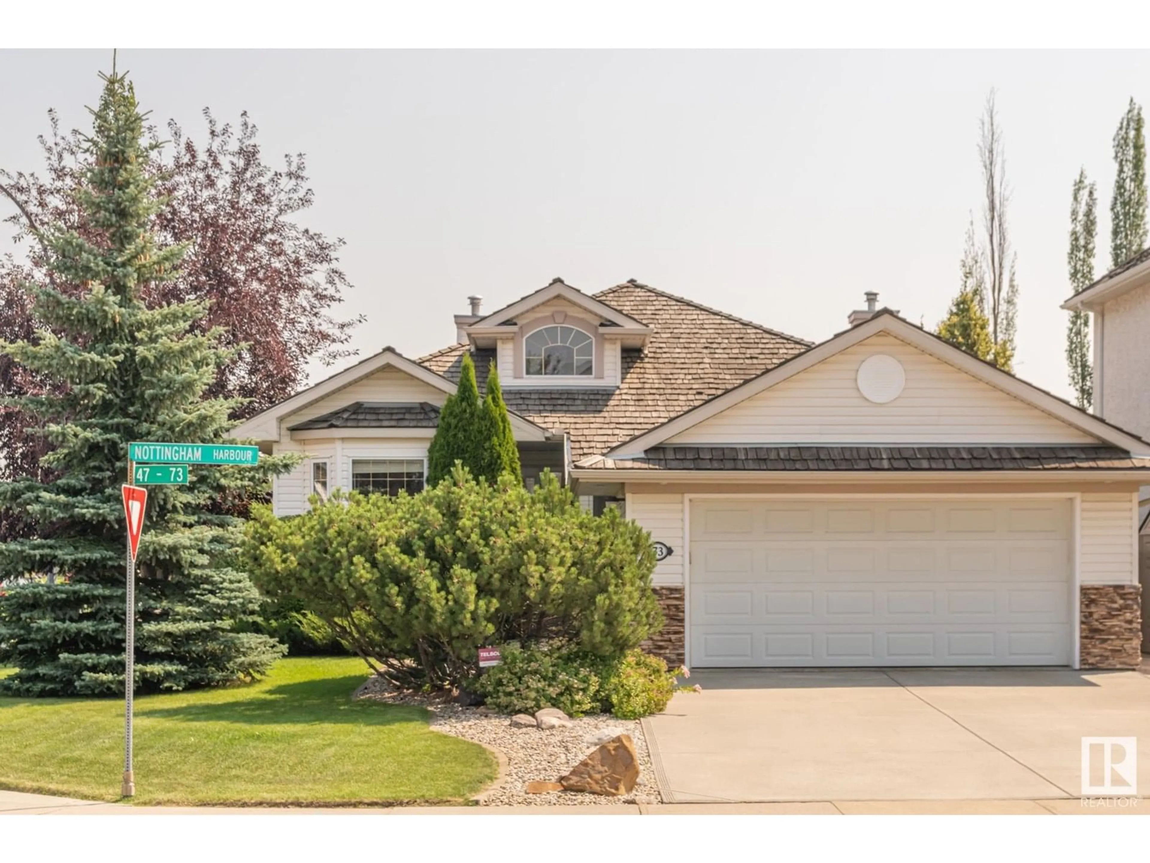Home with vinyl exterior material, street for 73 NOTTINGHAM HARBOUR, Sherwood Park Alberta T8A6E1
