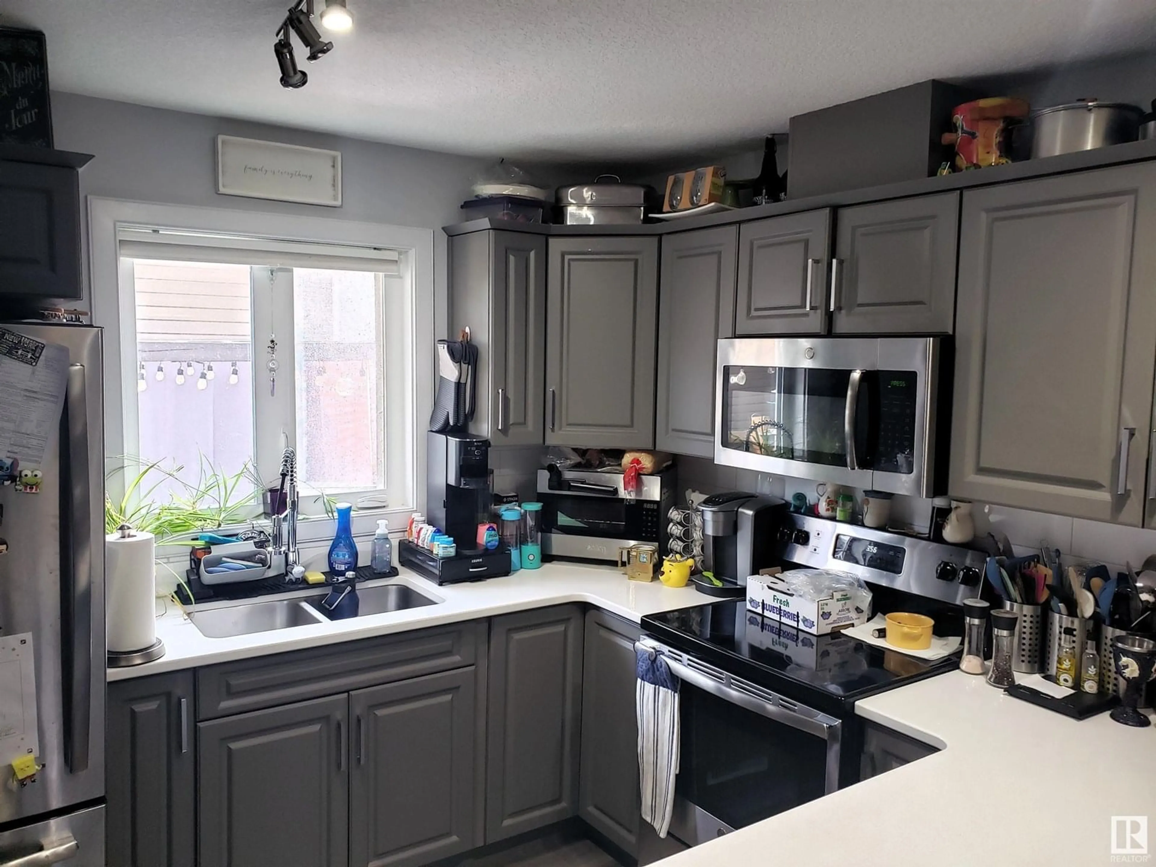 Open concept kitchen, unknown for 12325 122 AV, Edmonton Alberta T5L2Z8