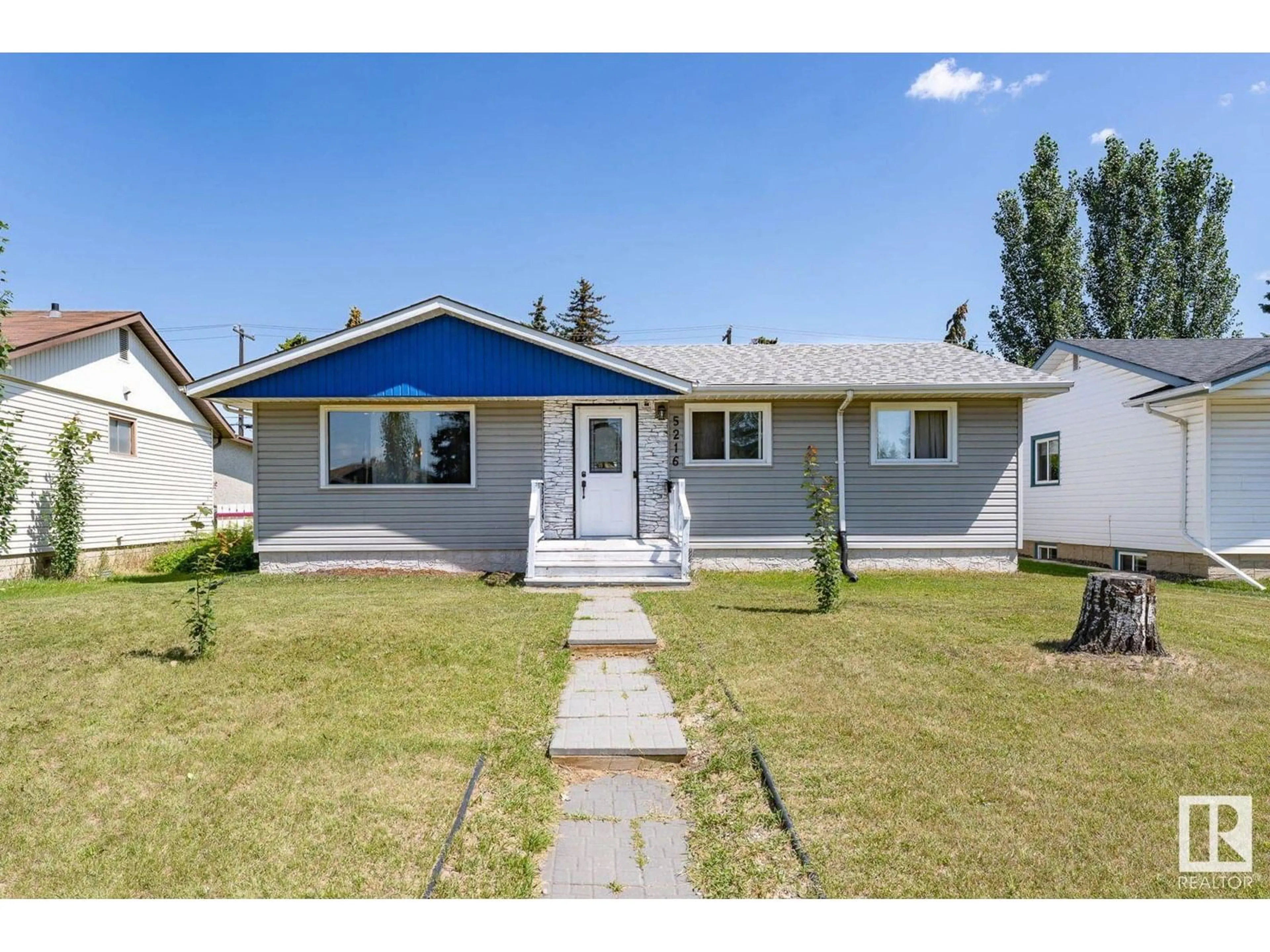Home with vinyl exterior material, street for 5216 97A AV, Edmonton Alberta T6B1E1