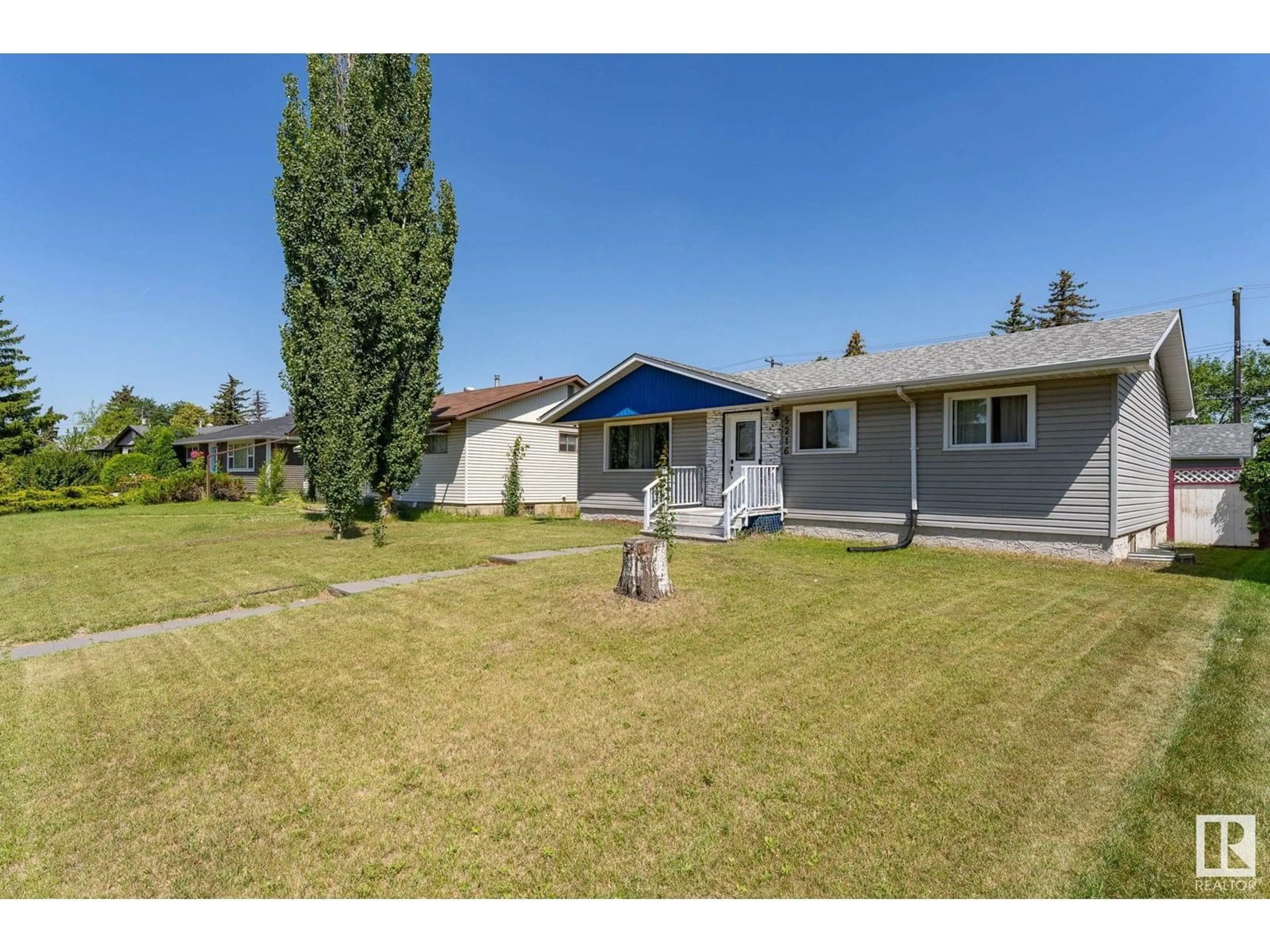 A pic from outside/outdoor area/front of a property/back of a property/a pic from drone, street for 5216 97A AV, Edmonton Alberta T6B1E1