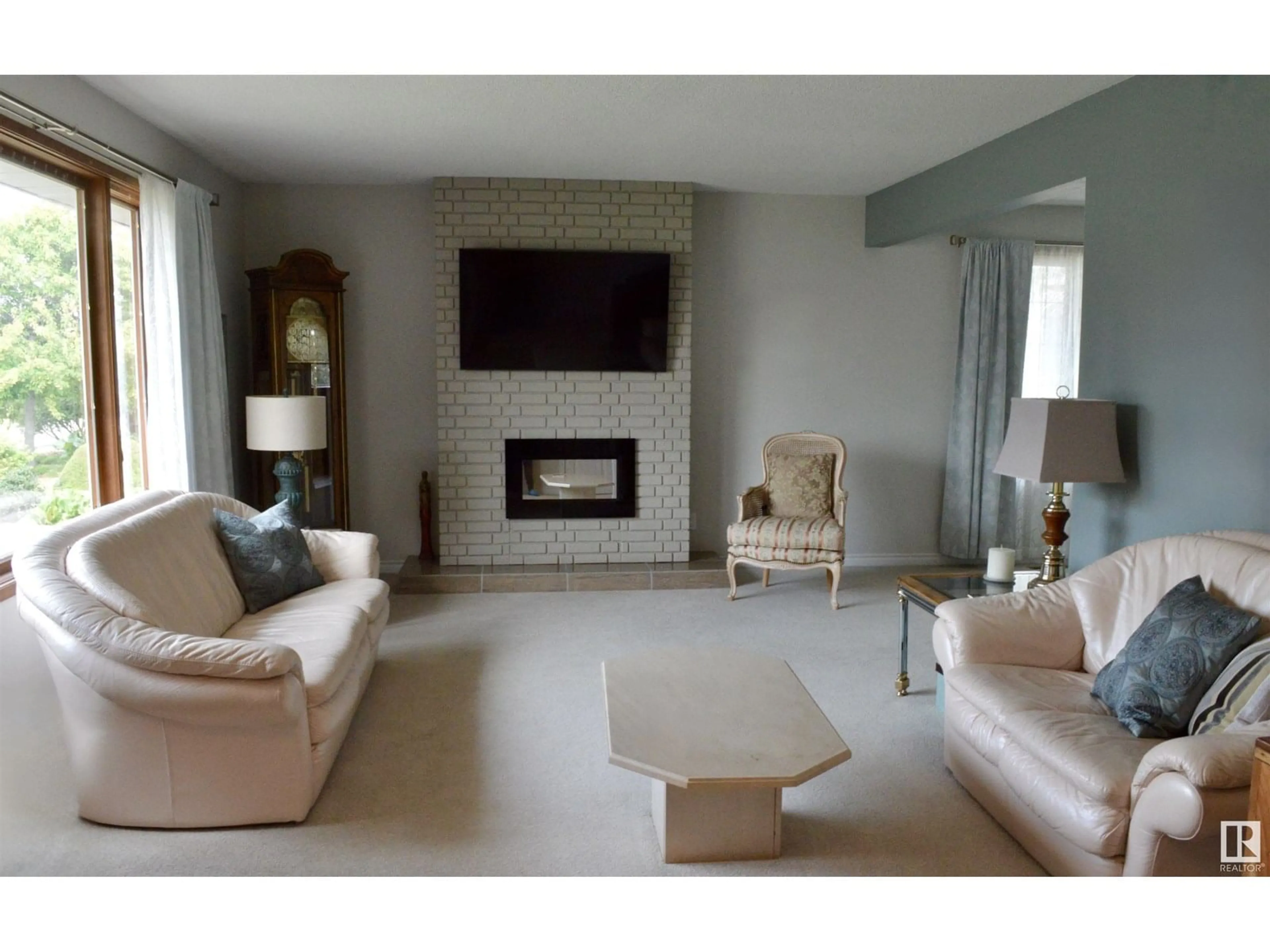Living room with furniture, unknown for 5619 140A AV, Edmonton Alberta T5A1H4
