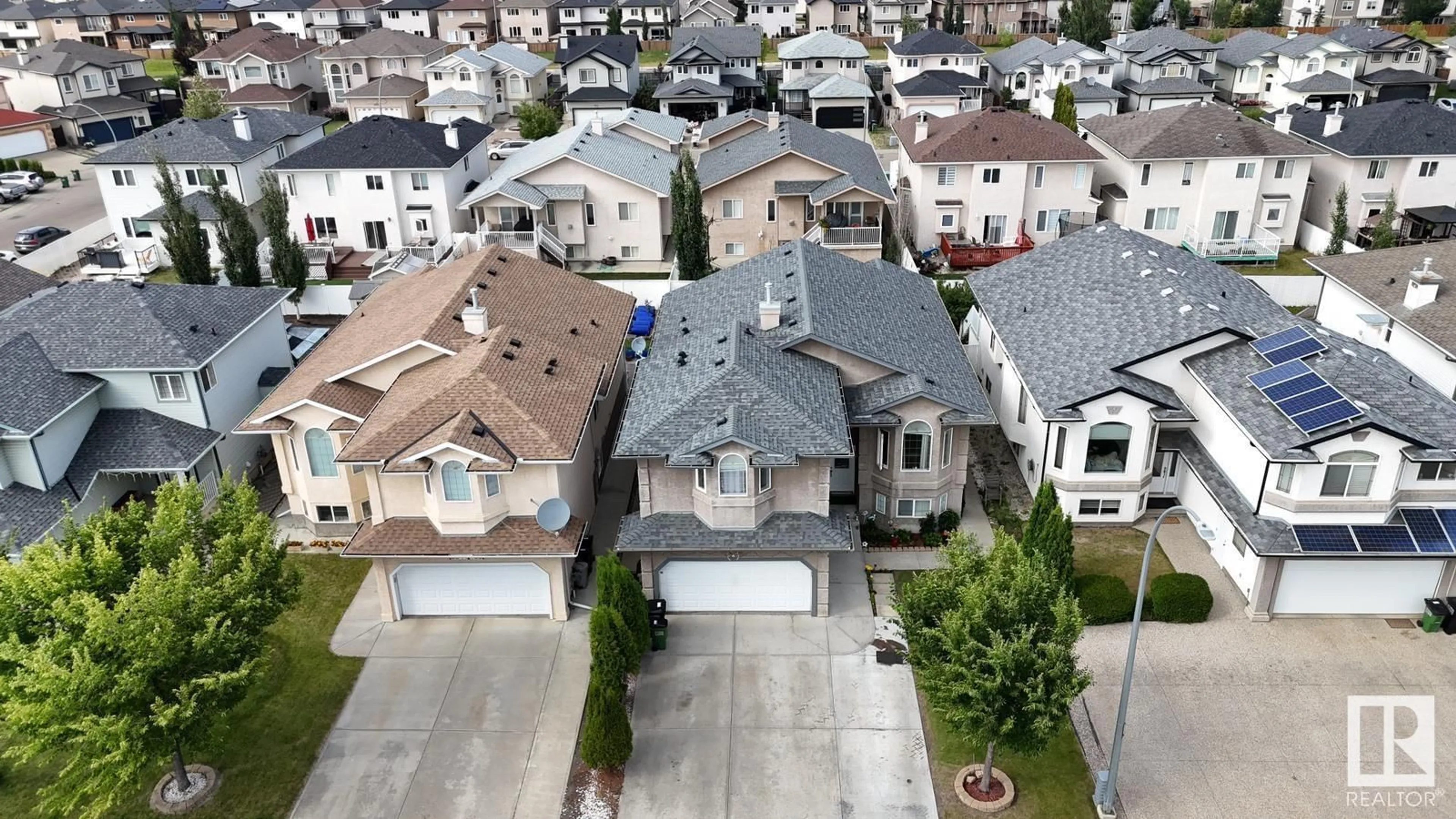 A pic from outside/outdoor area/front of a property/back of a property/a pic from drone, street for NW - 6040 165 AV, Edmonton Alberta T5Y0A9