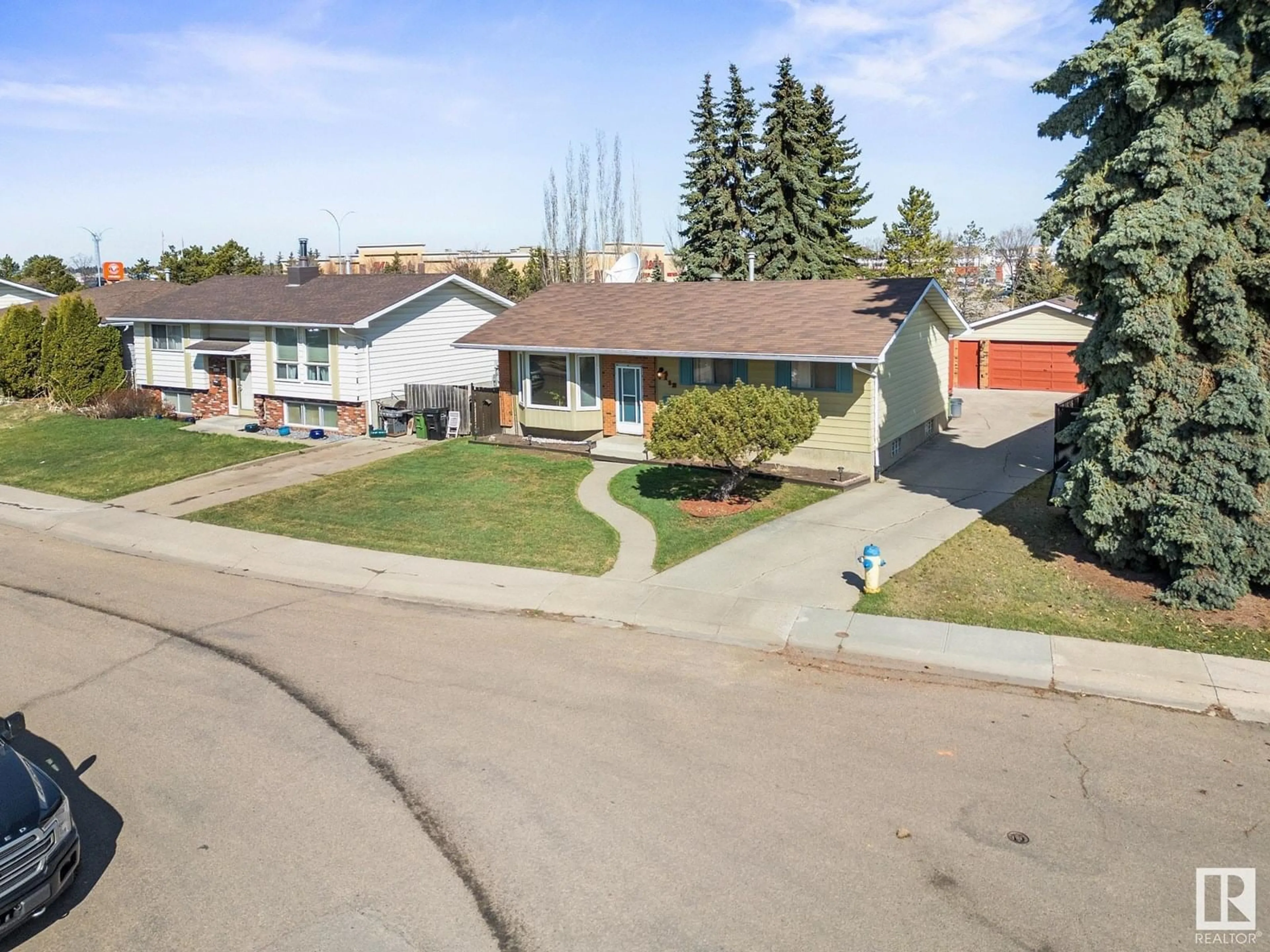 A pic from outside/outdoor area/front of a property/back of a property/a pic from drone, street for 4112 136 AV, Edmonton Alberta T5A2W8