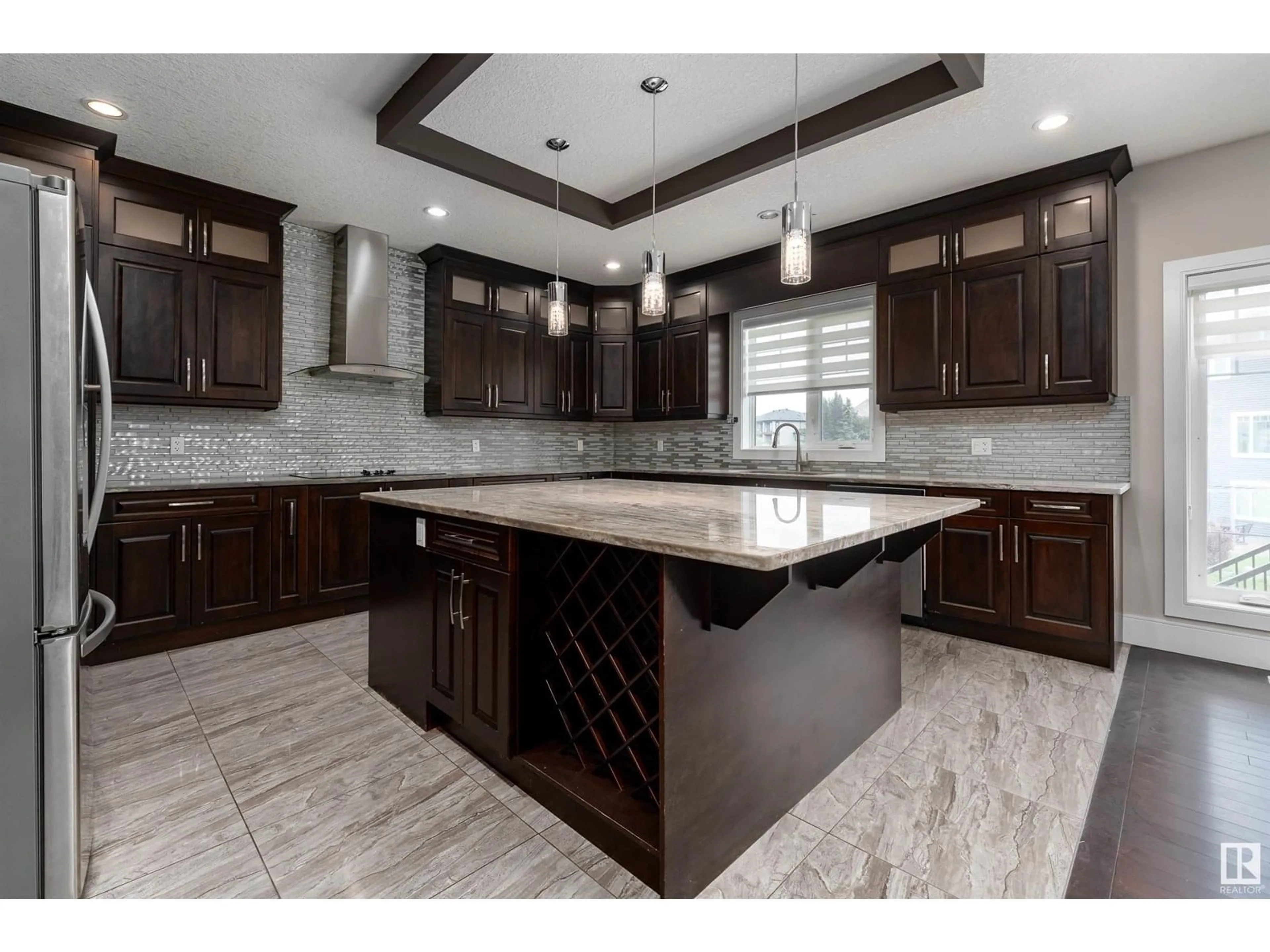 Open concept kitchen, ceramic/tile floor for 2422 ASHCRAFT CR, Edmonton Alberta T6W2M9