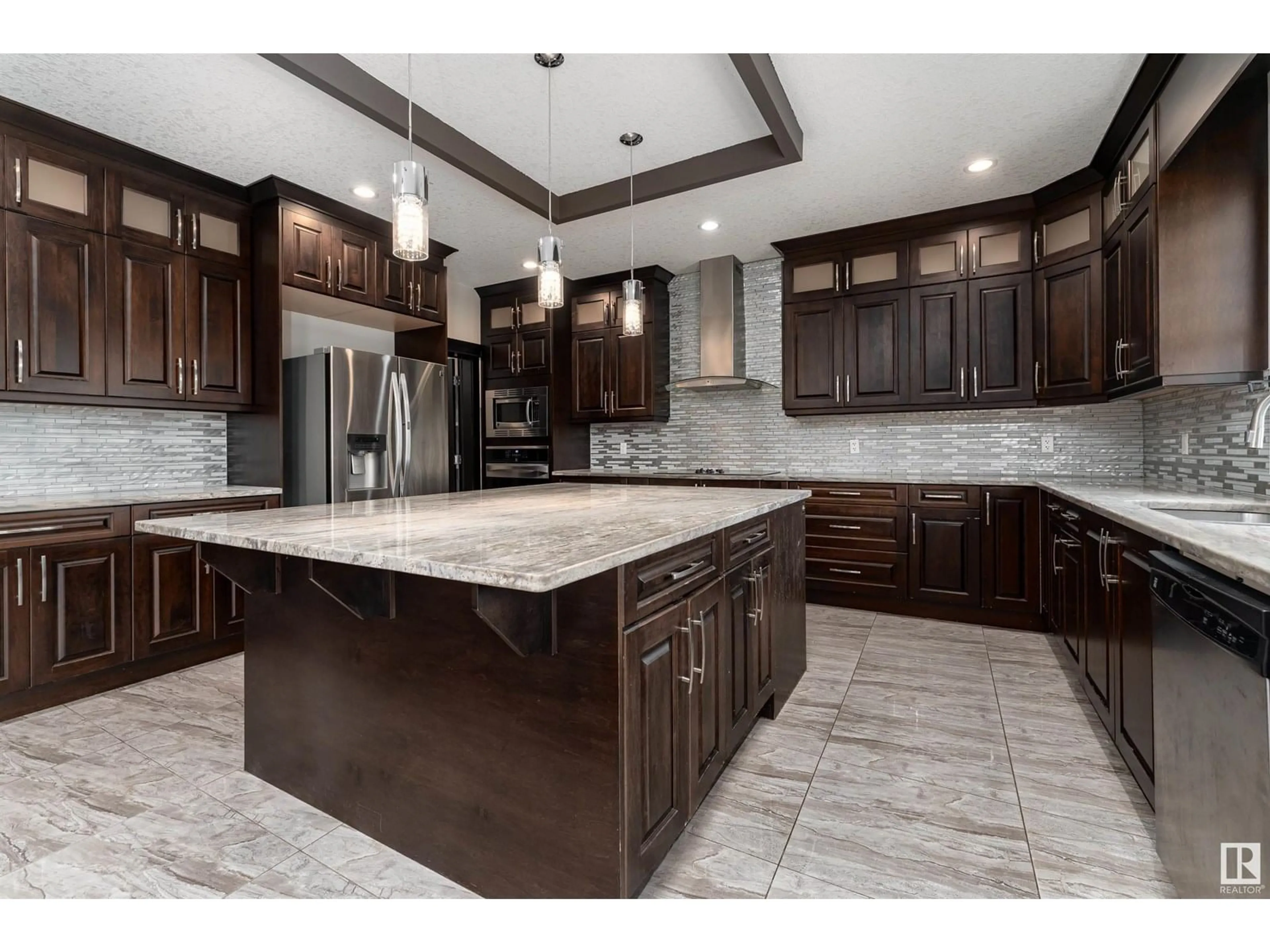 Open concept kitchen, ceramic/tile floor for 2422 ASHCRAFT CR, Edmonton Alberta T6W2M9