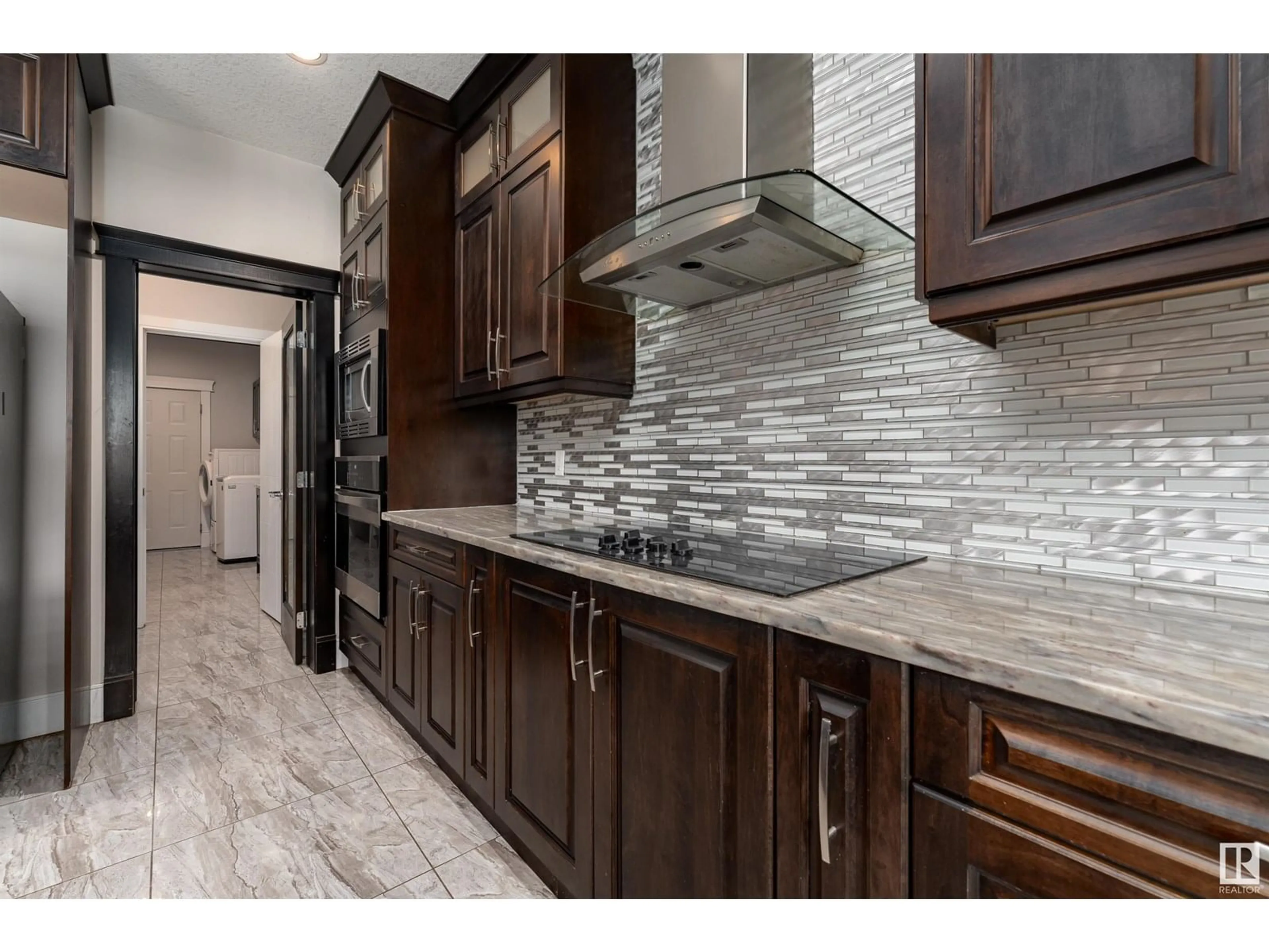 Open concept kitchen, ceramic/tile floor for 2422 ASHCRAFT CR, Edmonton Alberta T6W2M9