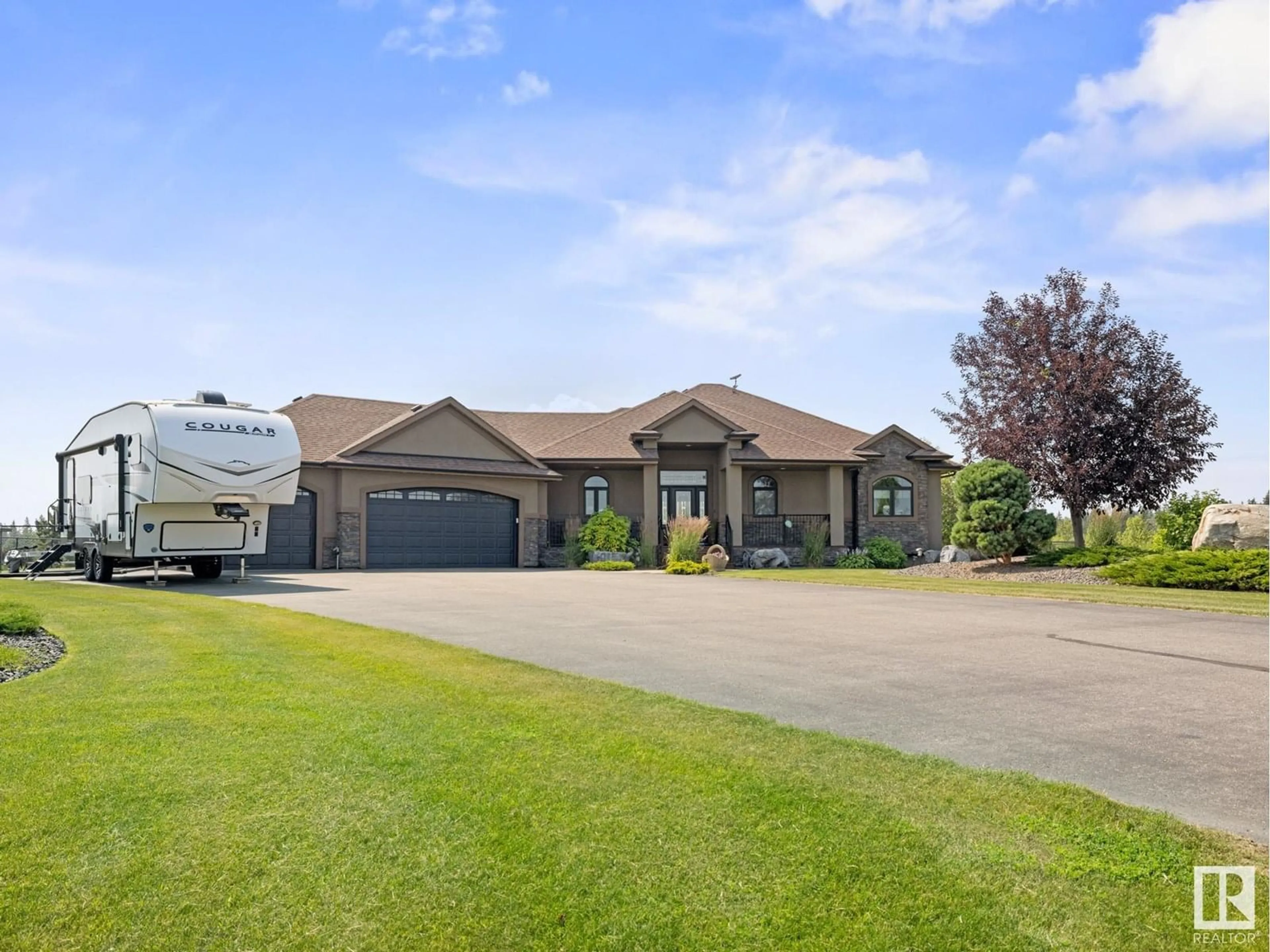 A pic from outside/outdoor area/front of a property/back of a property/a pic from drone, unknown for #8 - 27320 TWP ROAD 534, Rural Parkland County Alberta T7X3R9