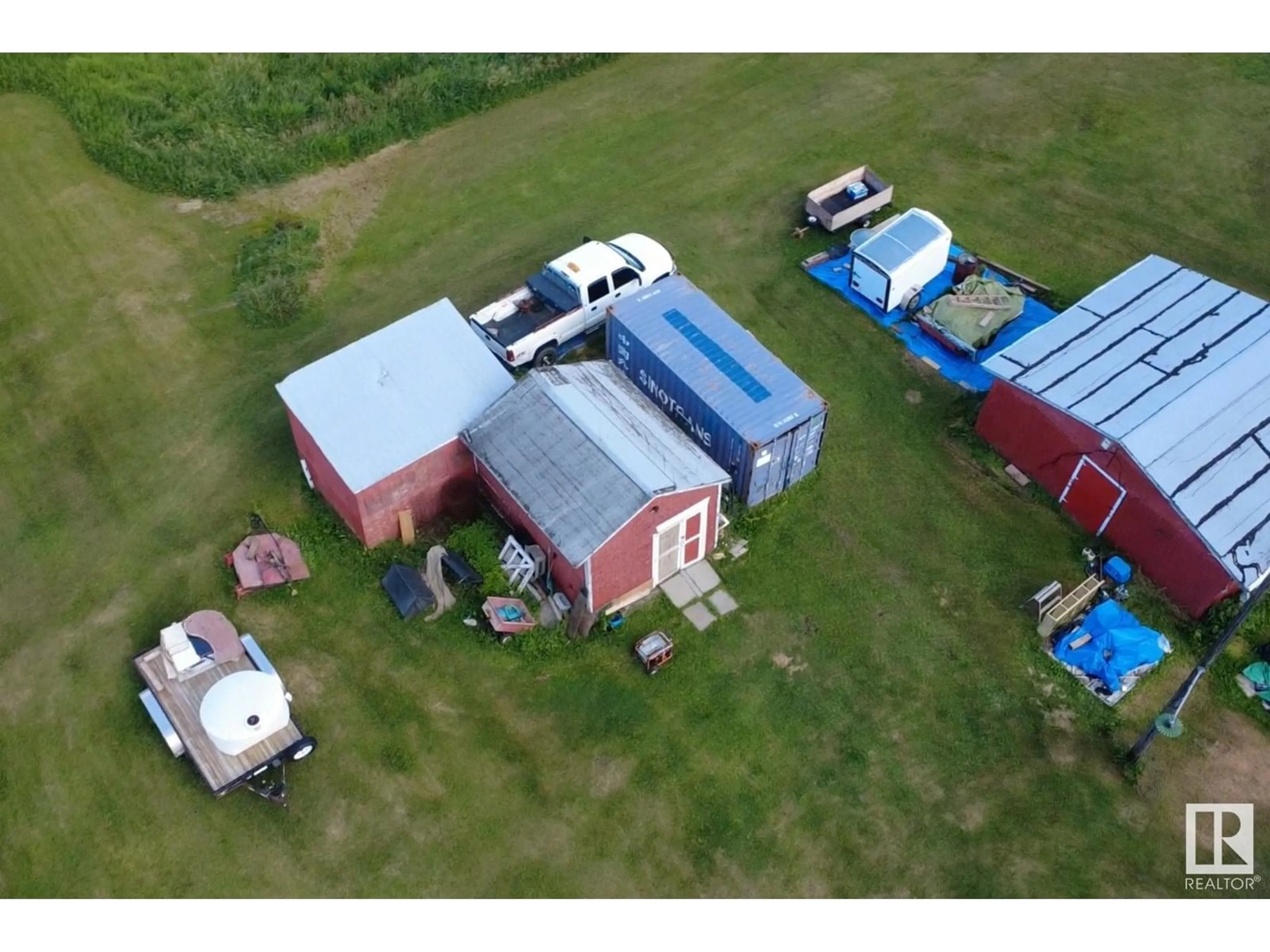 A pic from outside/outdoor area/front of a property/back of a property/a pic from drone, building for 53045 RGE ROAD 215, Rural Strathcona County Alberta T8A2E5