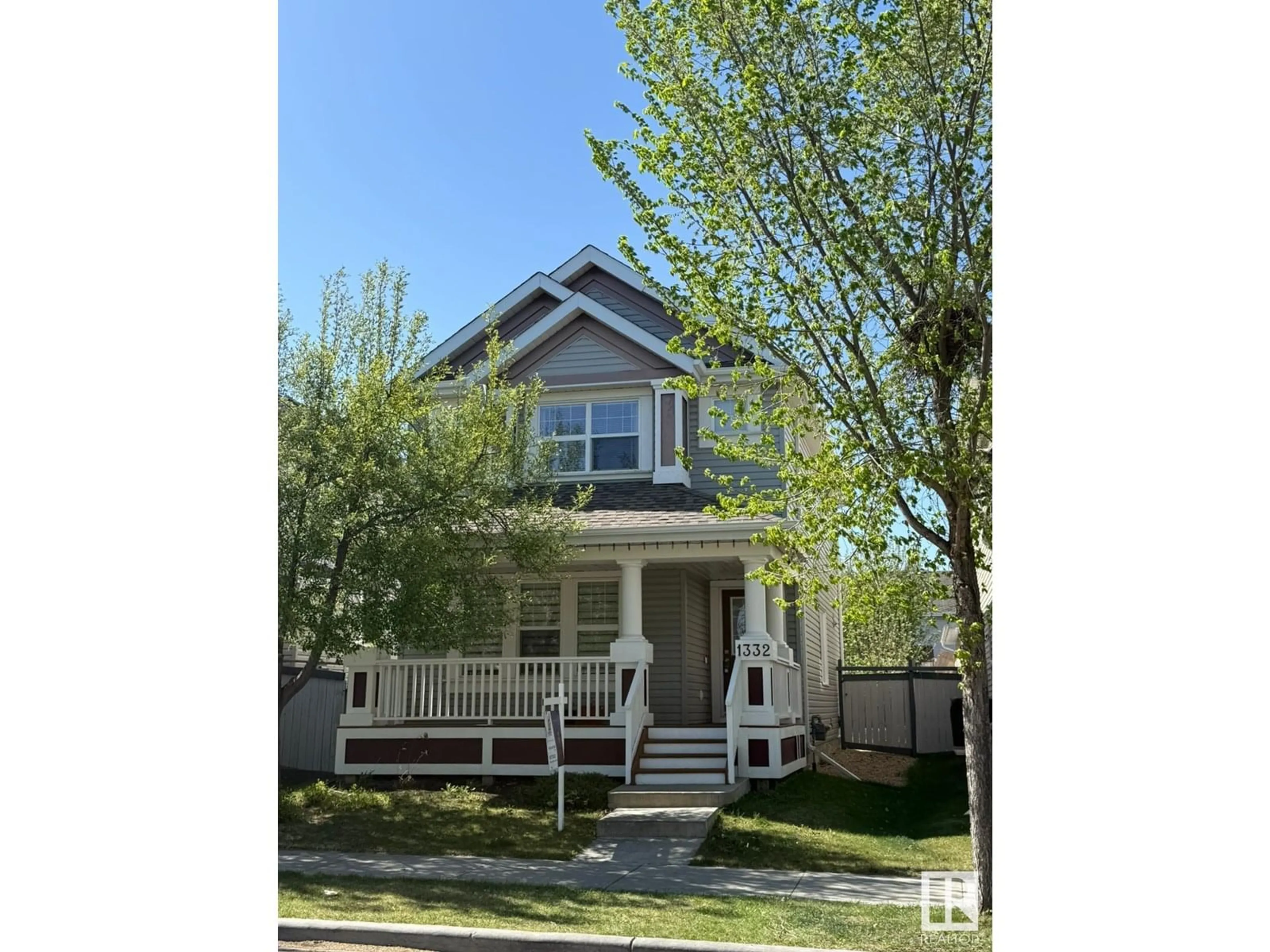 Home with vinyl exterior material, street for 1332 74 ST, Edmonton Alberta T6X0H1