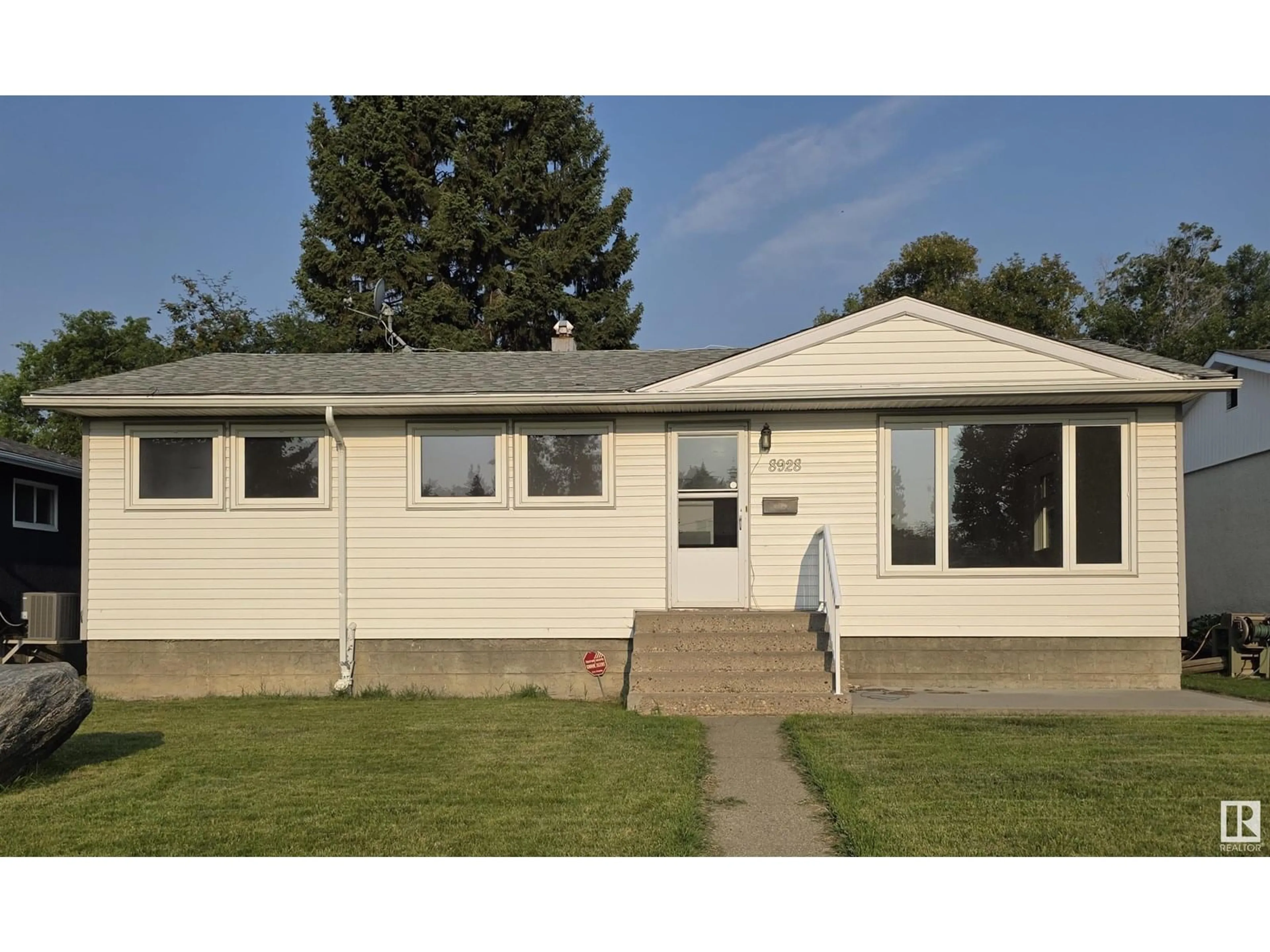 Home with vinyl exterior material, street for NW - 8928 147 ST, Edmonton Alberta T5R0Y3