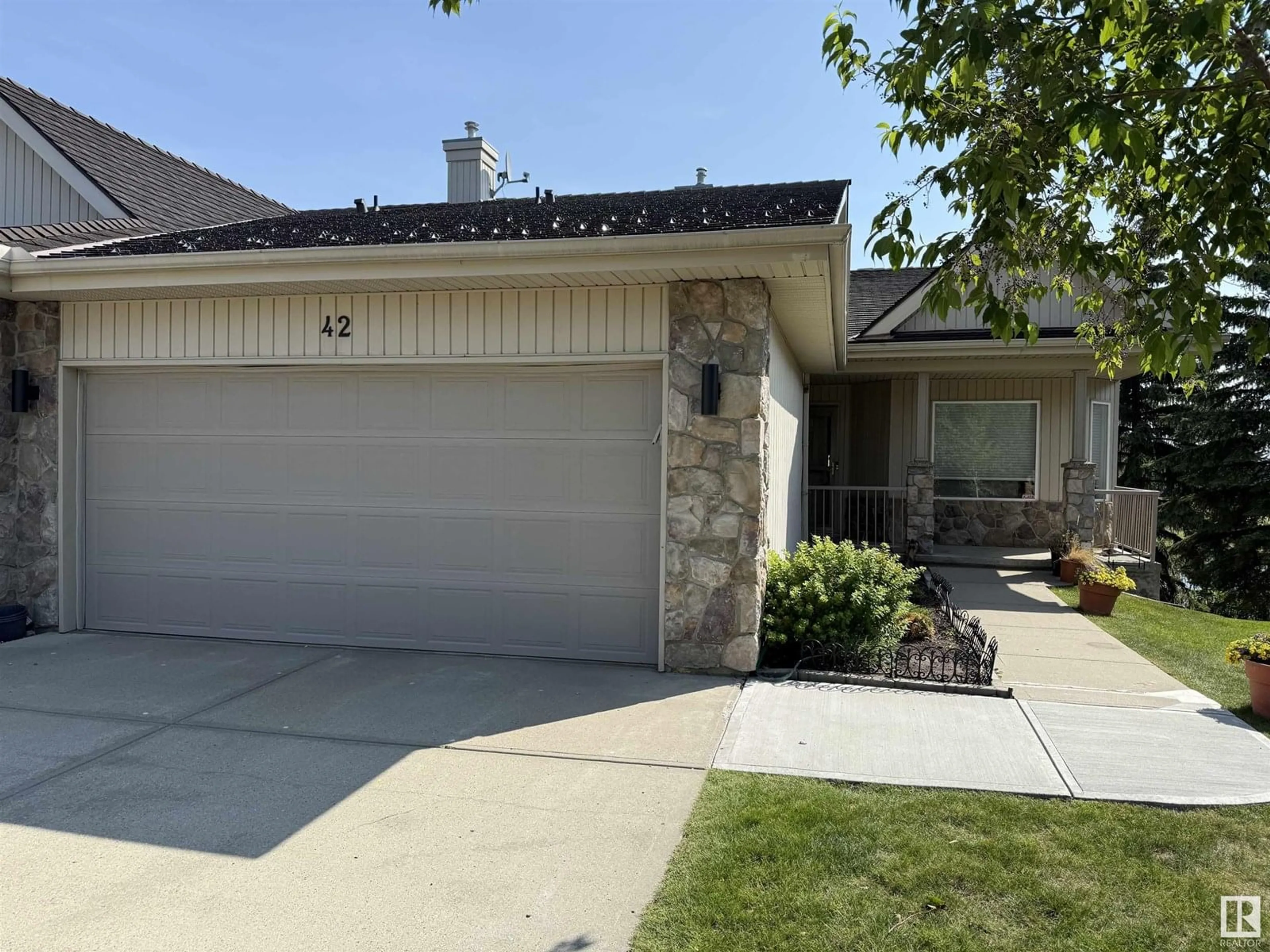 Home with vinyl exterior material, street for #42 - 929 PICARD DR, Edmonton Alberta T5T6H3