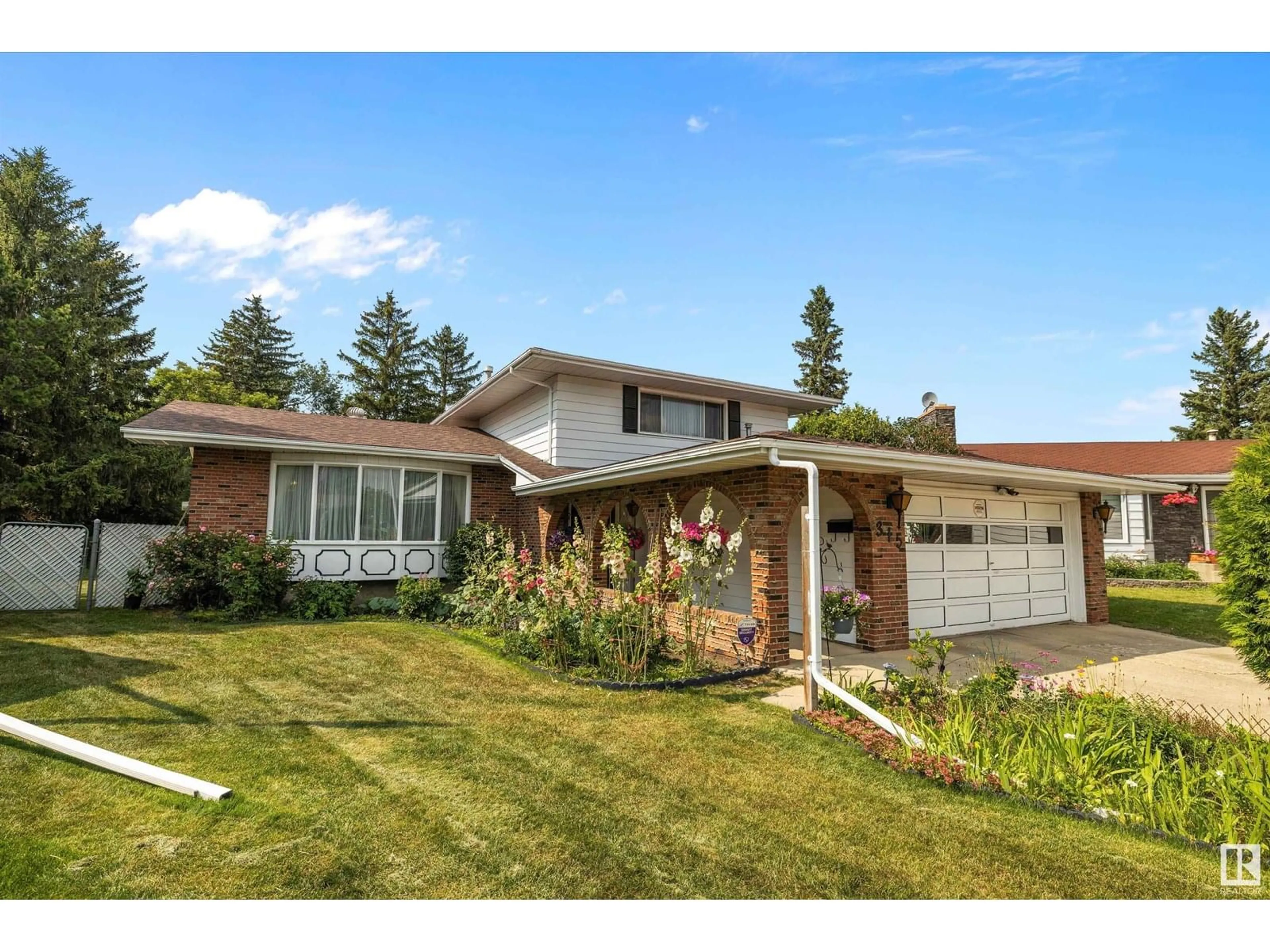 Home with brick exterior material, street for 315 LEE RIDGE RD, Edmonton Alberta T6K0N5