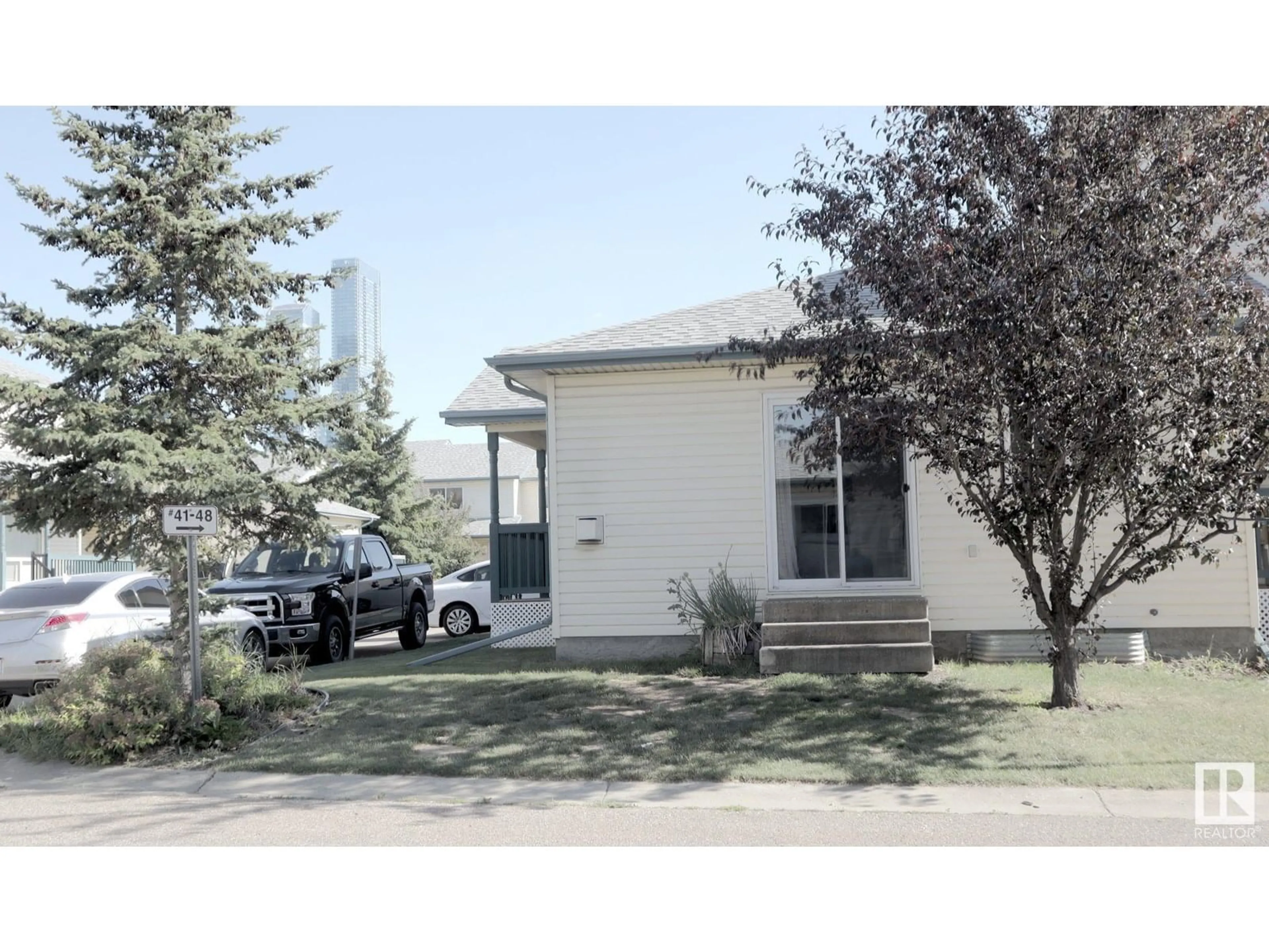 Home with vinyl exterior material, street for 49 - 10909 106 ST NW, Edmonton Alberta T5H4M7