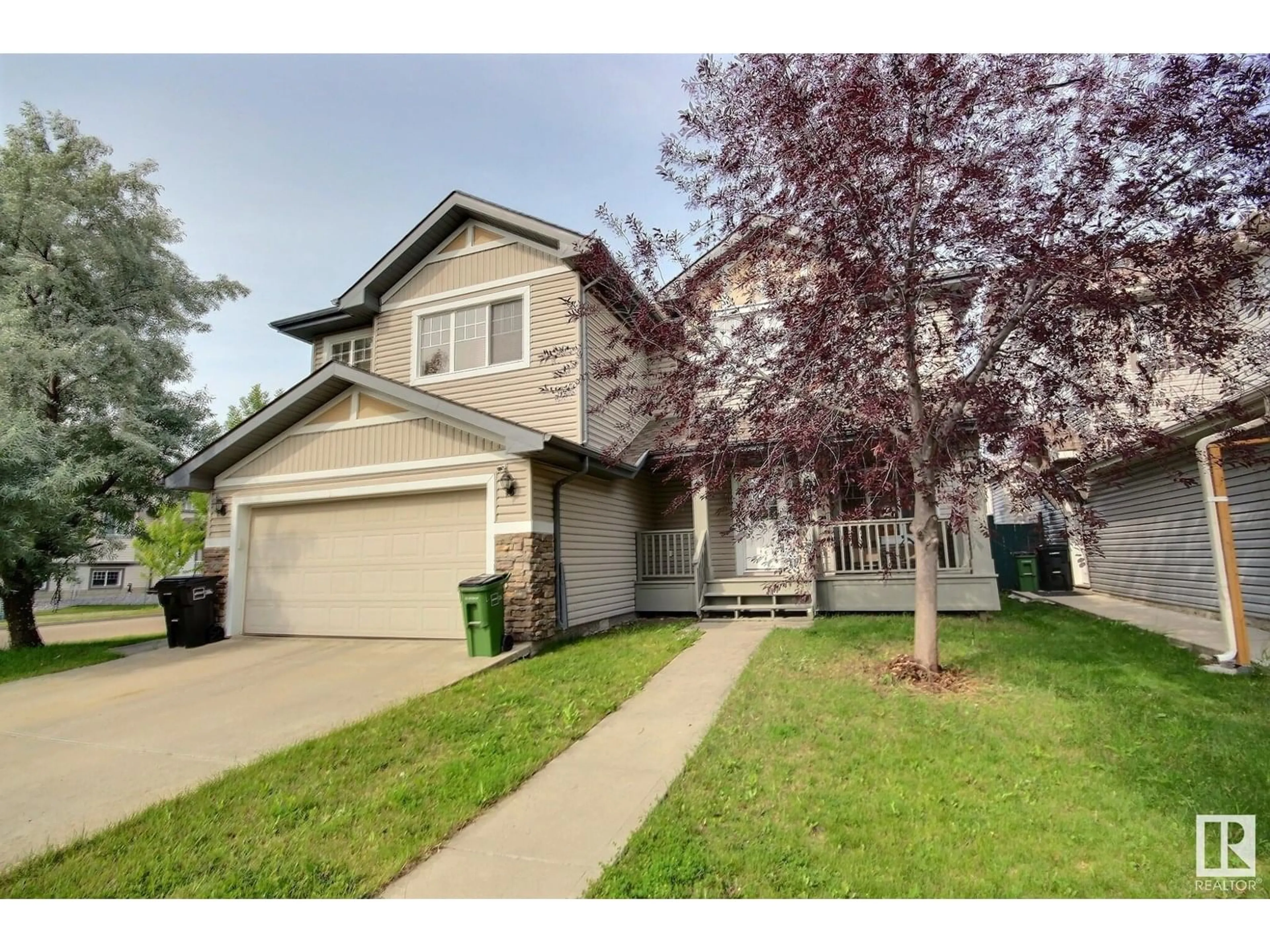 Home with vinyl exterior material, street for 1585 RUTHERFORD RD, Edmonton Alberta T6W0A9
