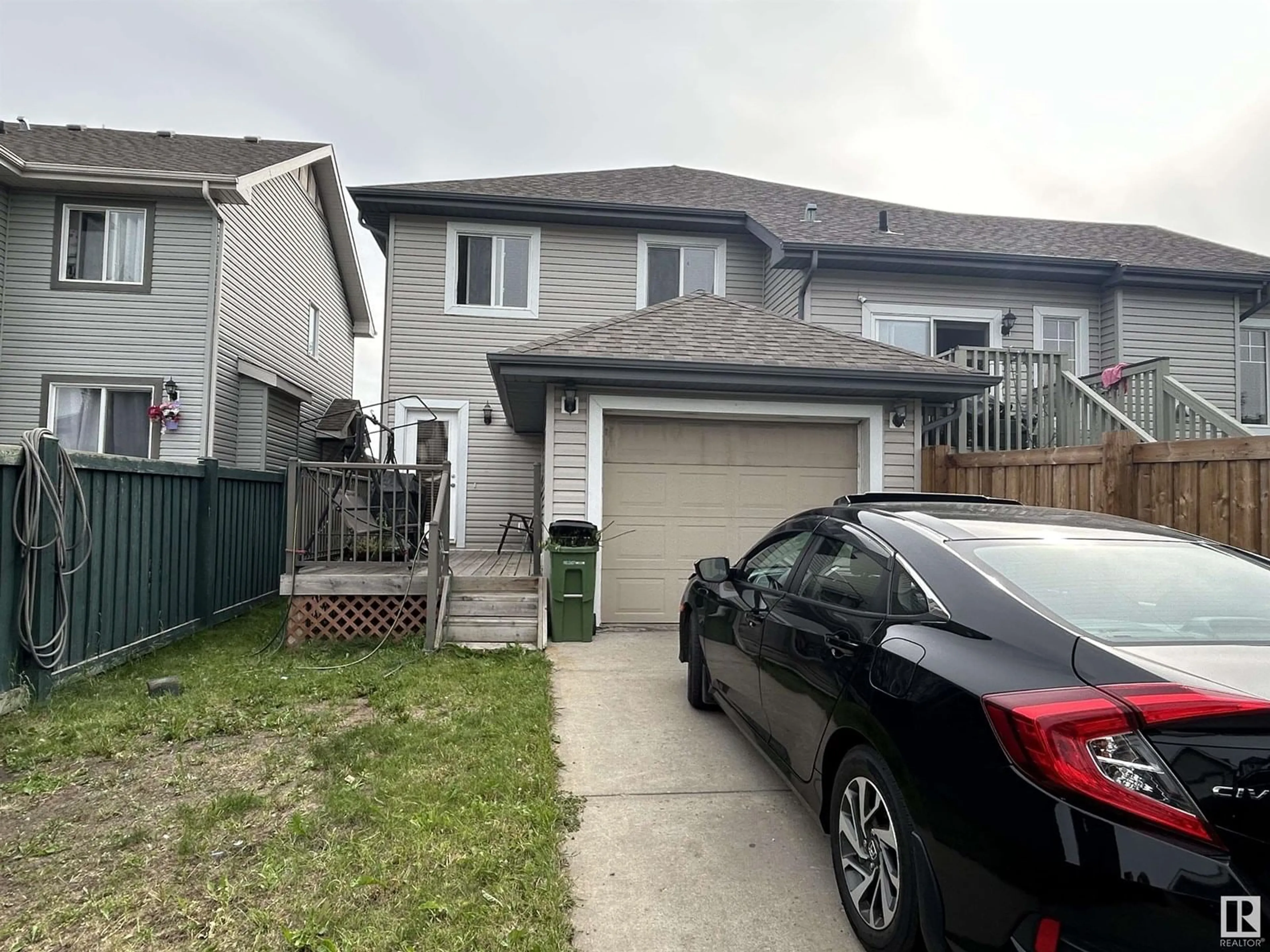 A pic from outside/outdoor area/front of a property/back of a property/a pic from drone, street for 1585 RUTHERFORD RD, Edmonton Alberta T6W0A9