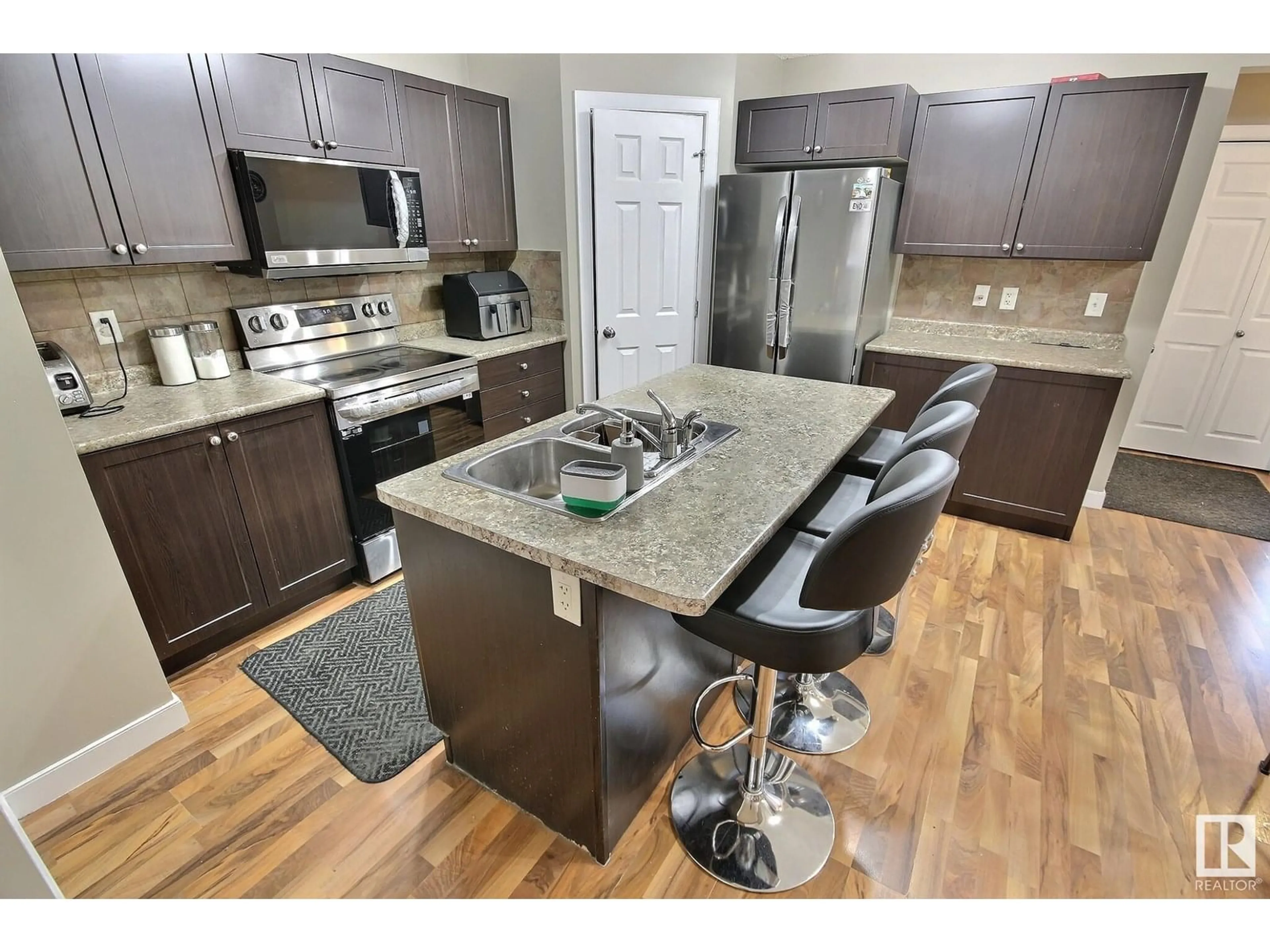 Open concept kitchen, unknown for 1585 RUTHERFORD RD, Edmonton Alberta T6W0A9