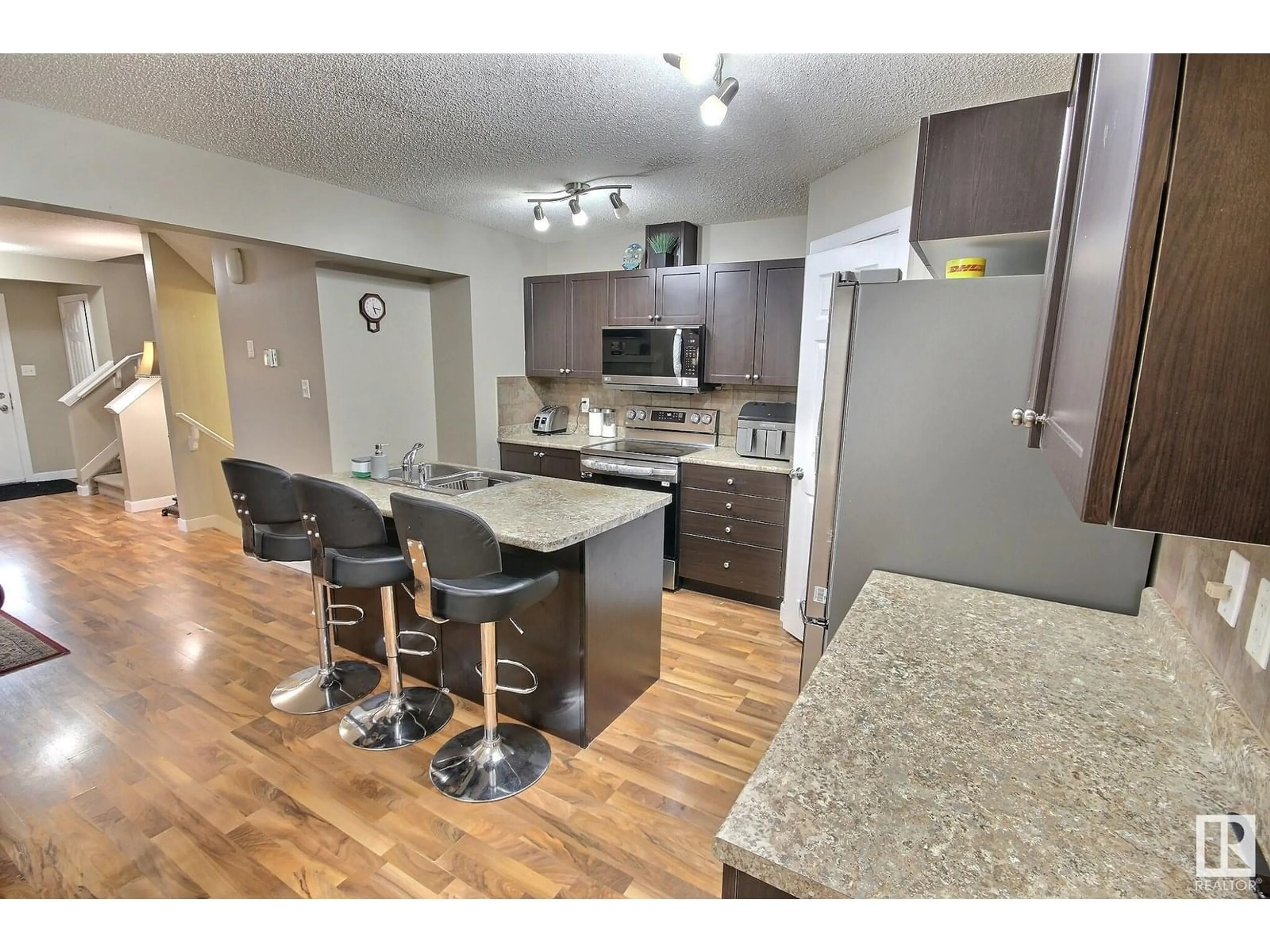 Open concept kitchen, unknown for 1585 RUTHERFORD RD, Edmonton Alberta T6W0A9