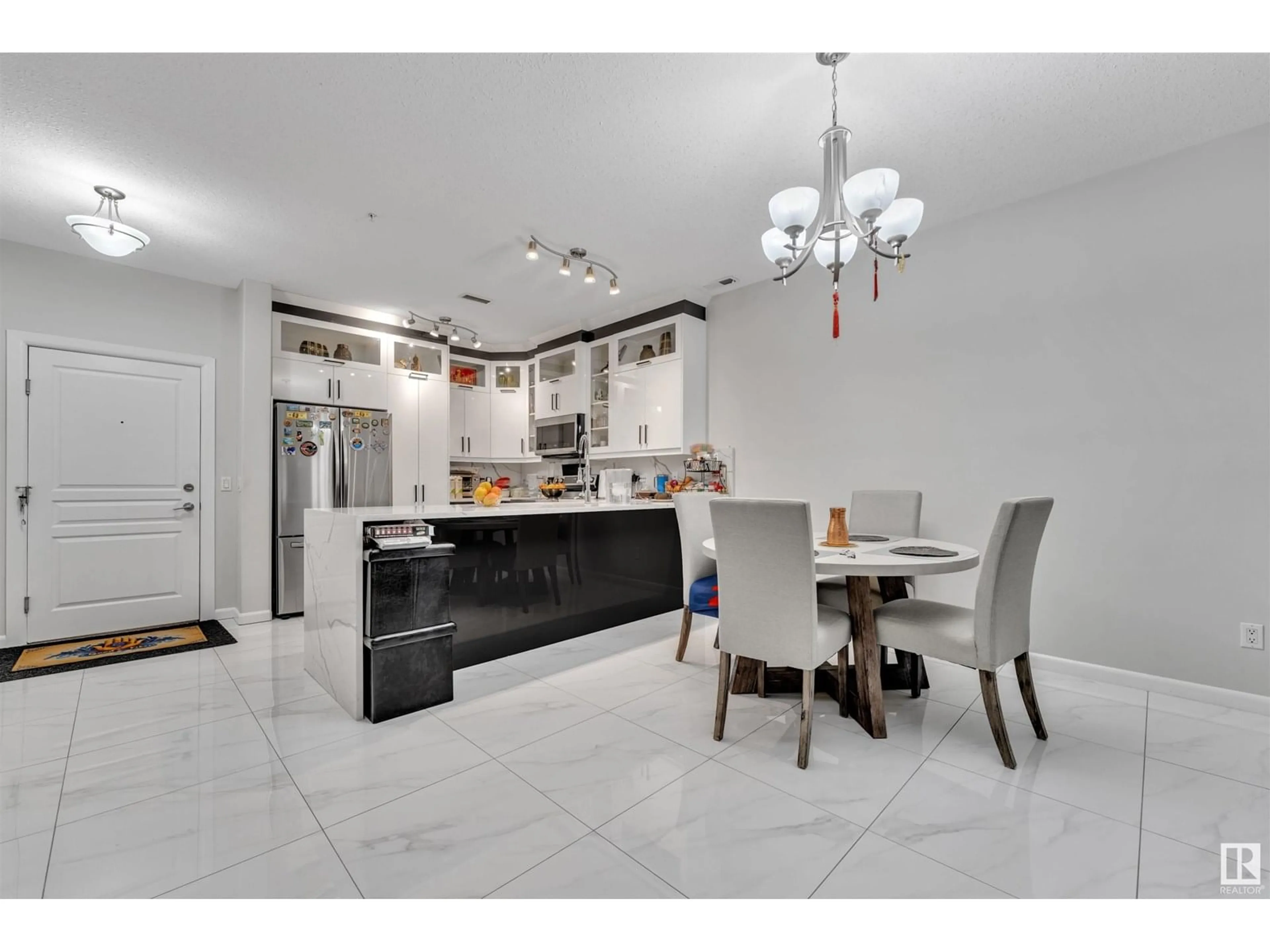 Open concept kitchen, ceramic/tile floor for #105 - 160 MAGRATH ROAD, Edmonton Alberta T6R3T7