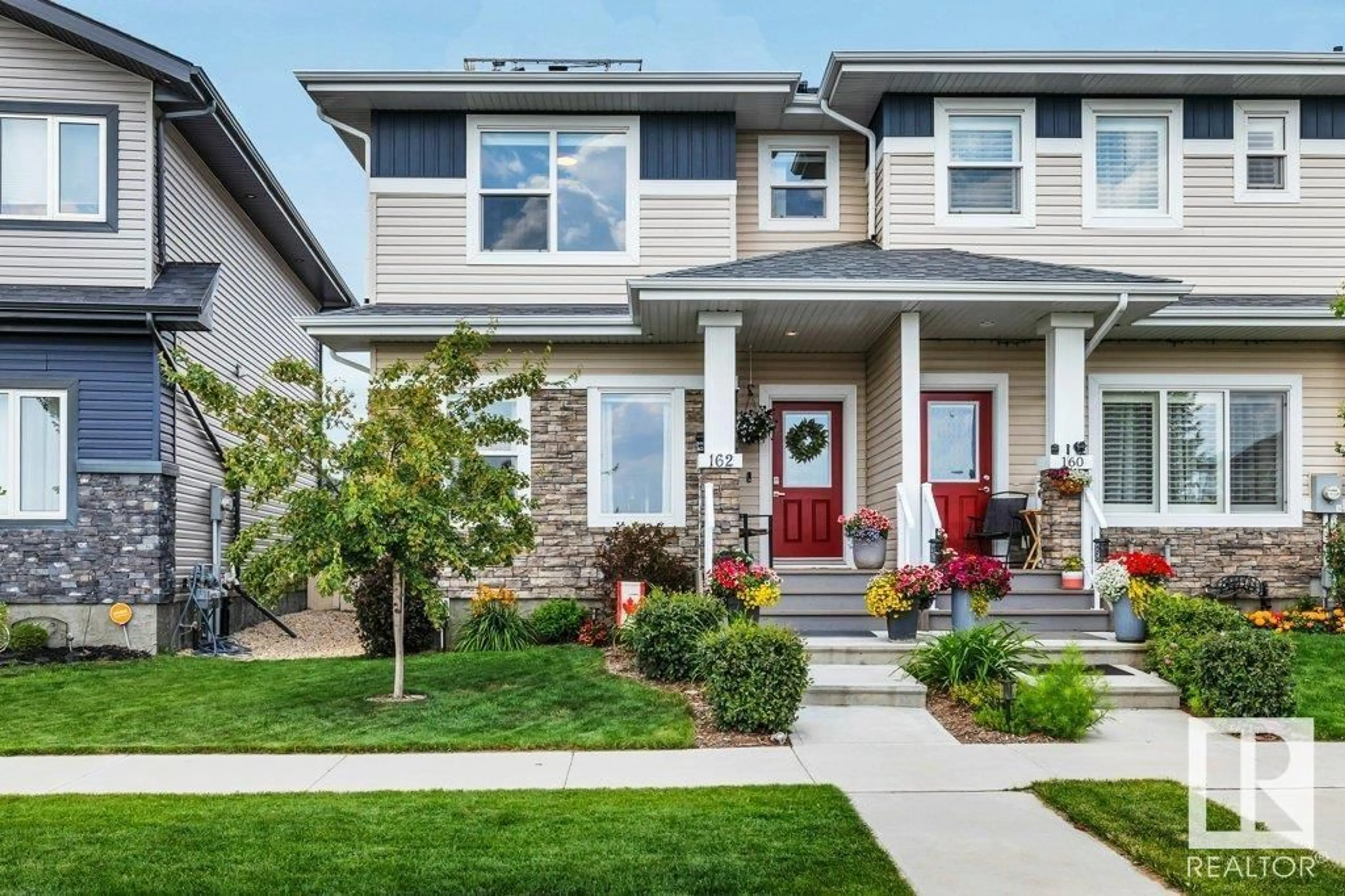 Home with vinyl exterior material, street for 162 DANSEREAU WY, Beaumont Alberta T4X2Y5