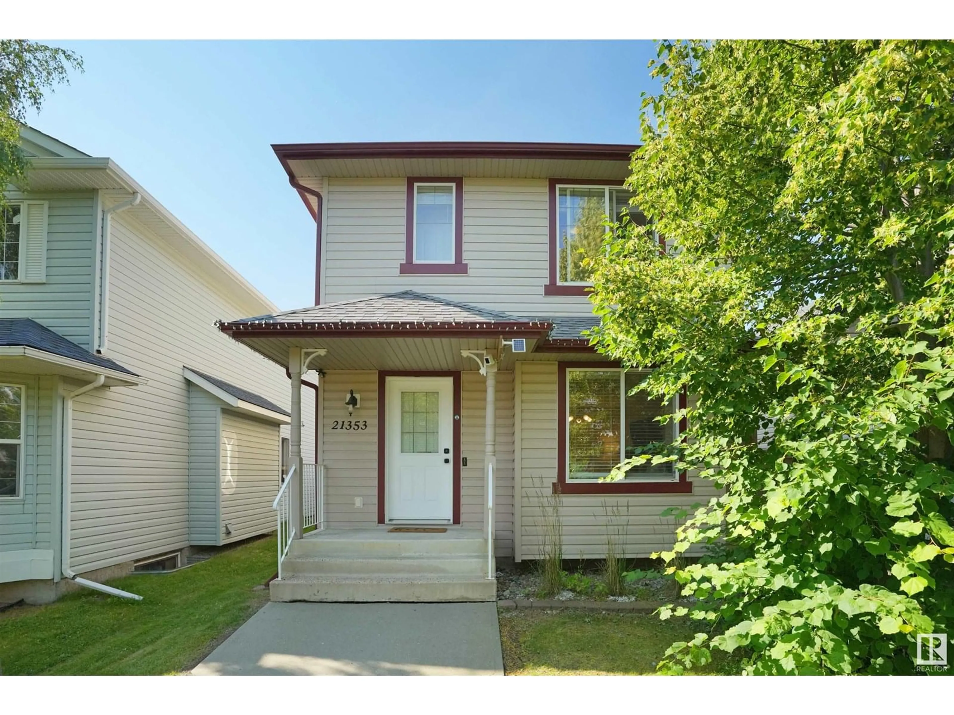 Home with vinyl exterior material, street for 21353 87A AV, Edmonton Alberta T5T6T7