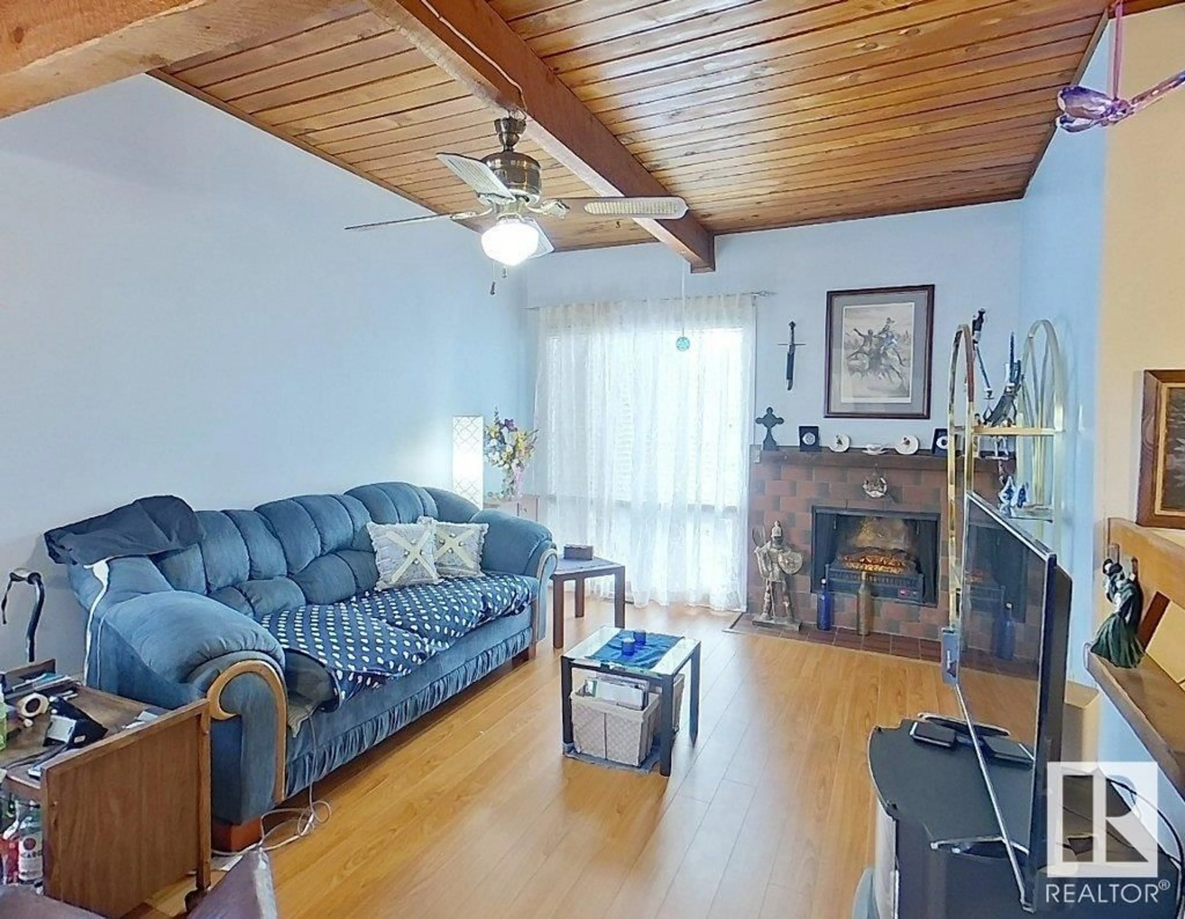 Living room with furniture, wood/laminate floor for 14 NORTHWOODS VG, Edmonton Alberta T5X1T2