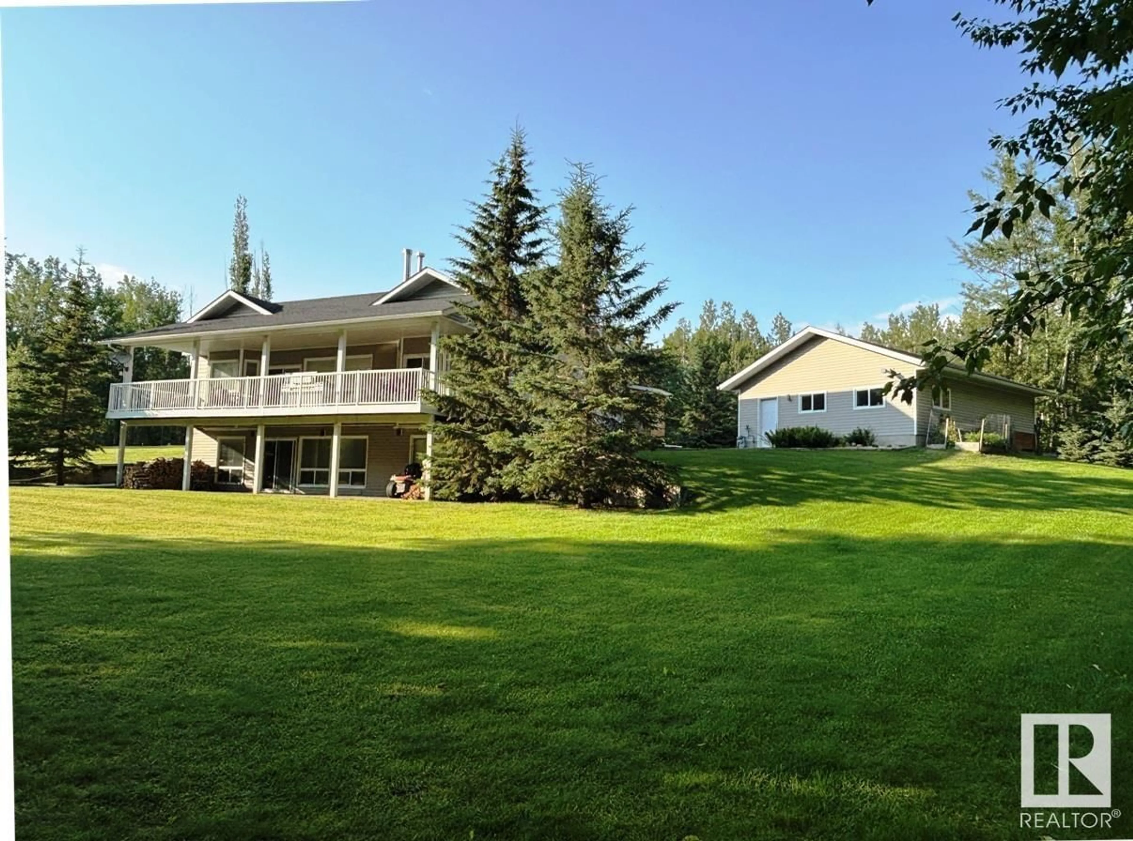 A pic from outside/outdoor area/front of a property/back of a property/a pic from drone, mountain view for 465022 - 74 RGE ROAD 61, Rural Wetaskiwin County Alberta T0C0T0