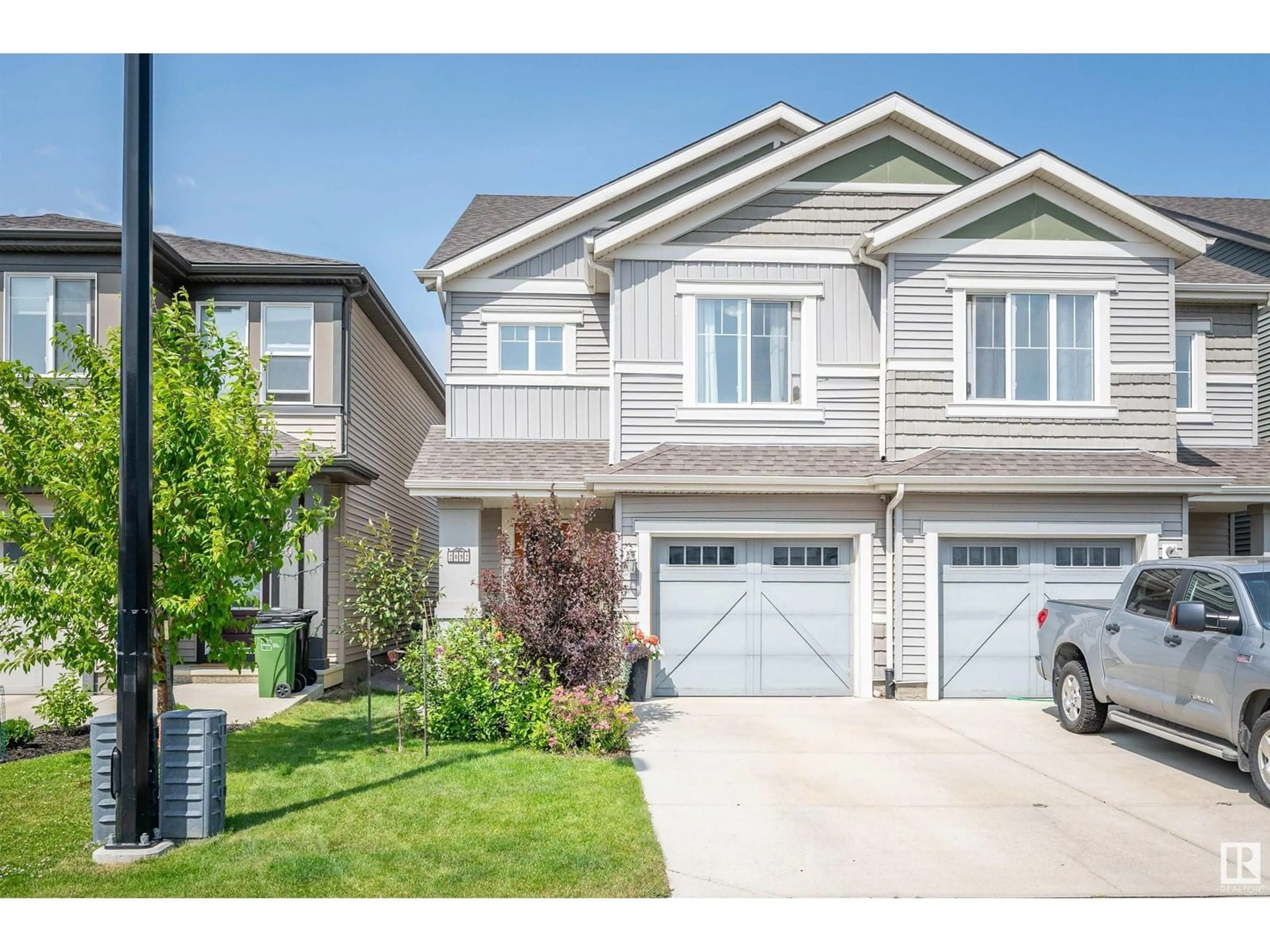 Home with vinyl exterior material, street for 2092 PRICE LANDING LD, Edmonton Alberta T6W3W1