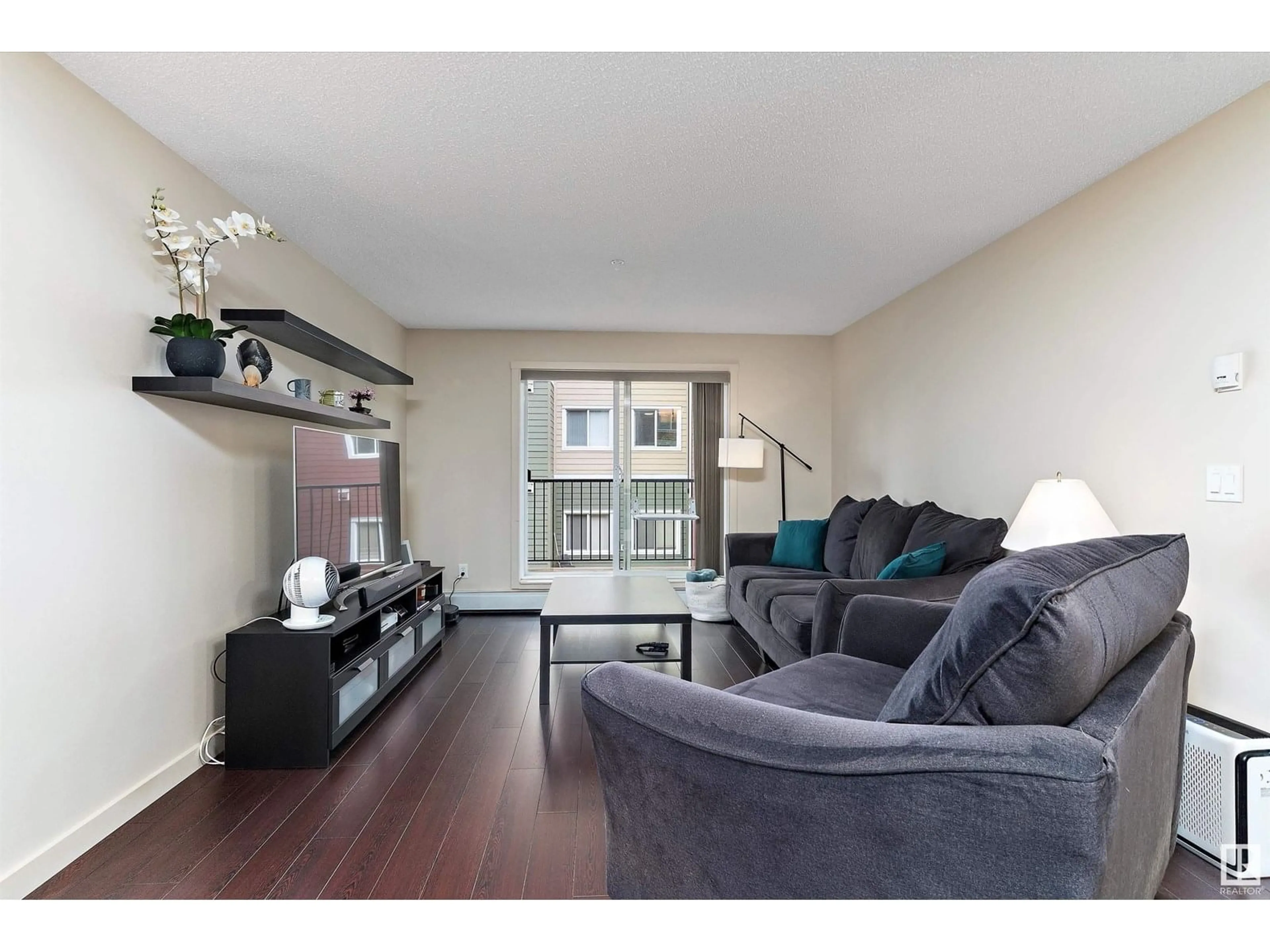 Living room with furniture, unknown for #238 - 6076 SCHONSEE WY, Edmonton Alberta T5Z0K8