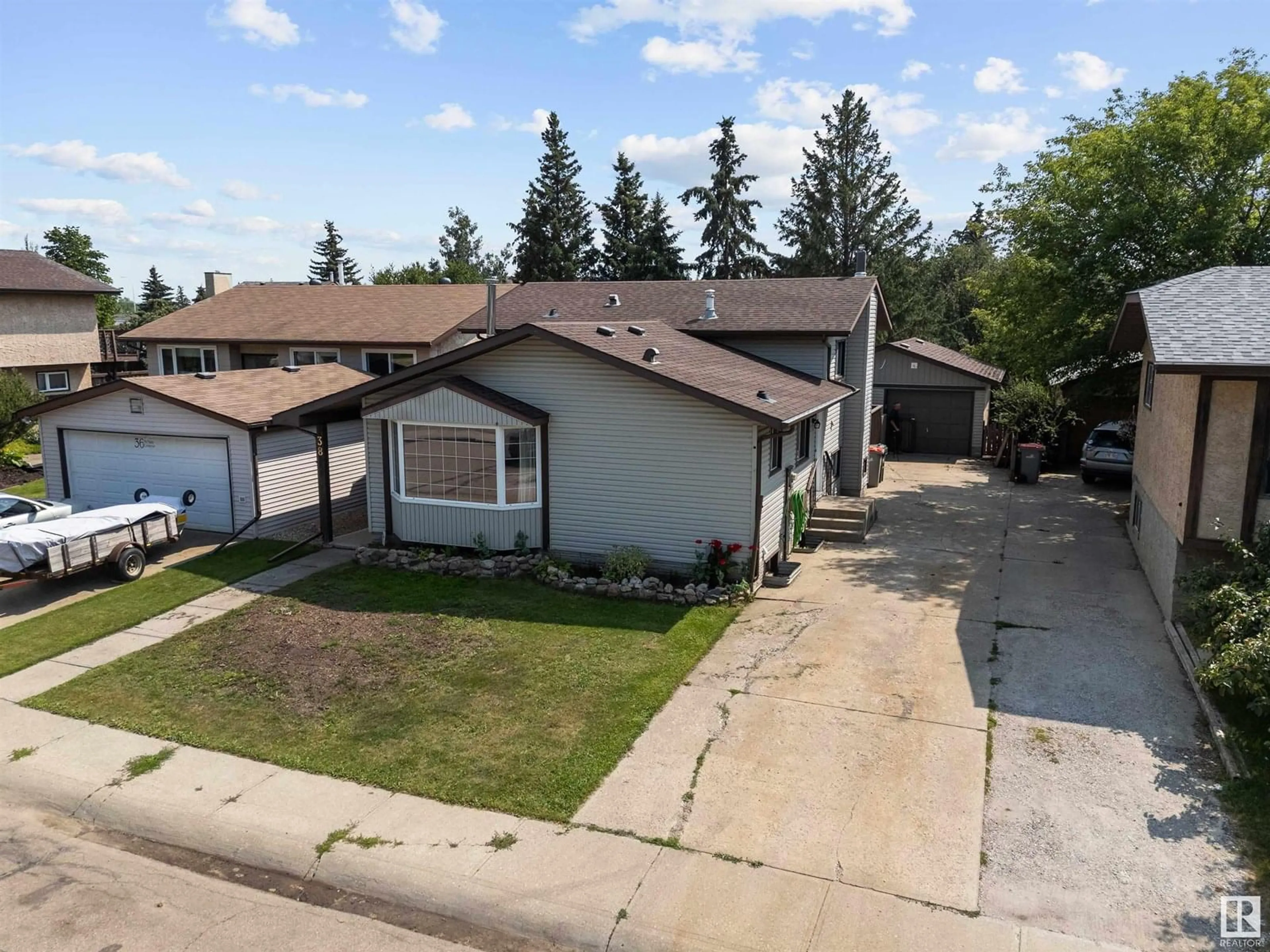 A pic from outside/outdoor area/front of a property/back of a property/a pic from drone, street for 38 MCNABB CR, Stony Plain Alberta T7Z1G8
