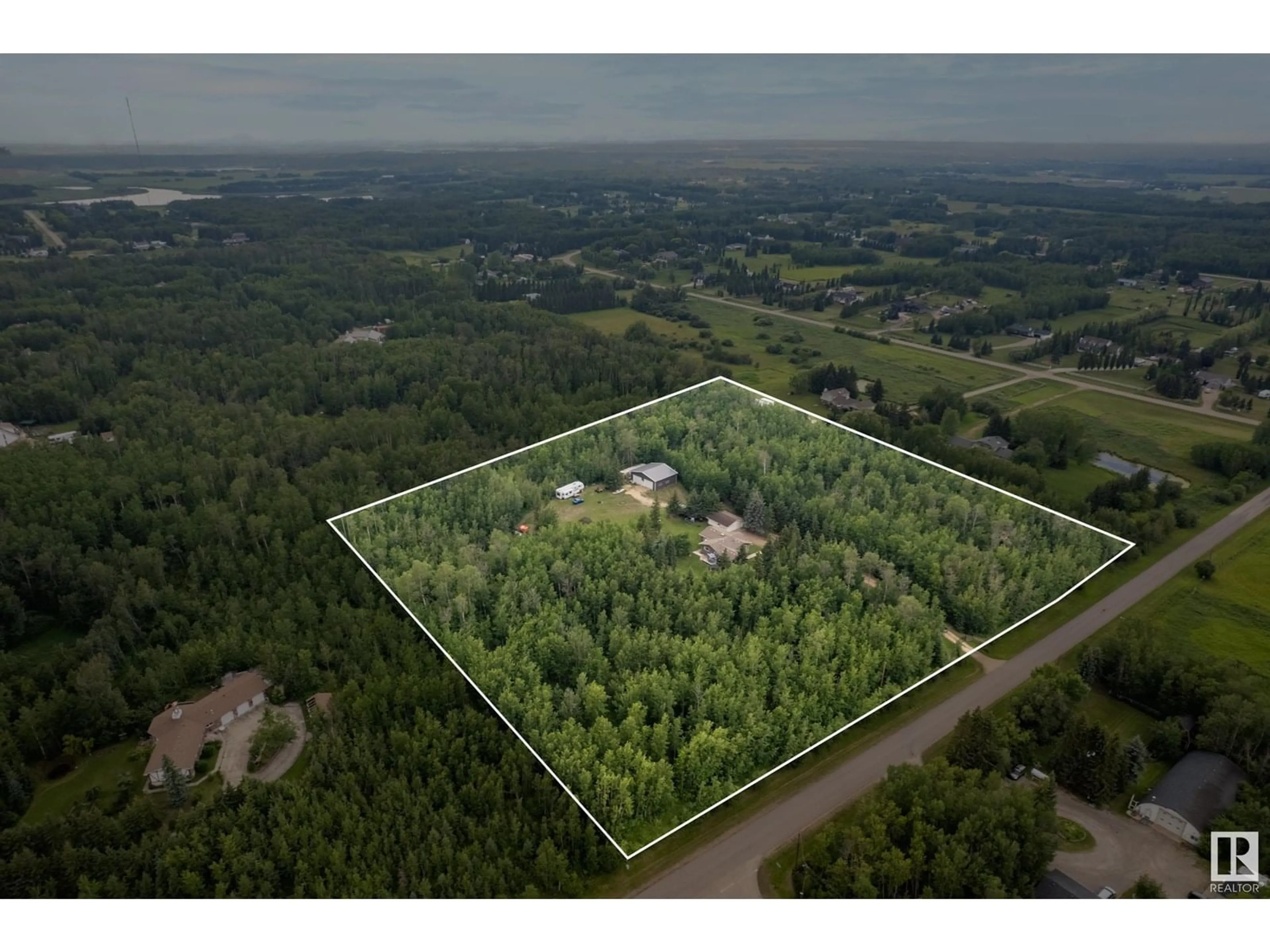 A pic from outside/outdoor area/front of a property/back of a property/a pic from drone, forest/trees view for 51336 RGE ROAD 224, Rural Strathcona County Alberta T8C1H3