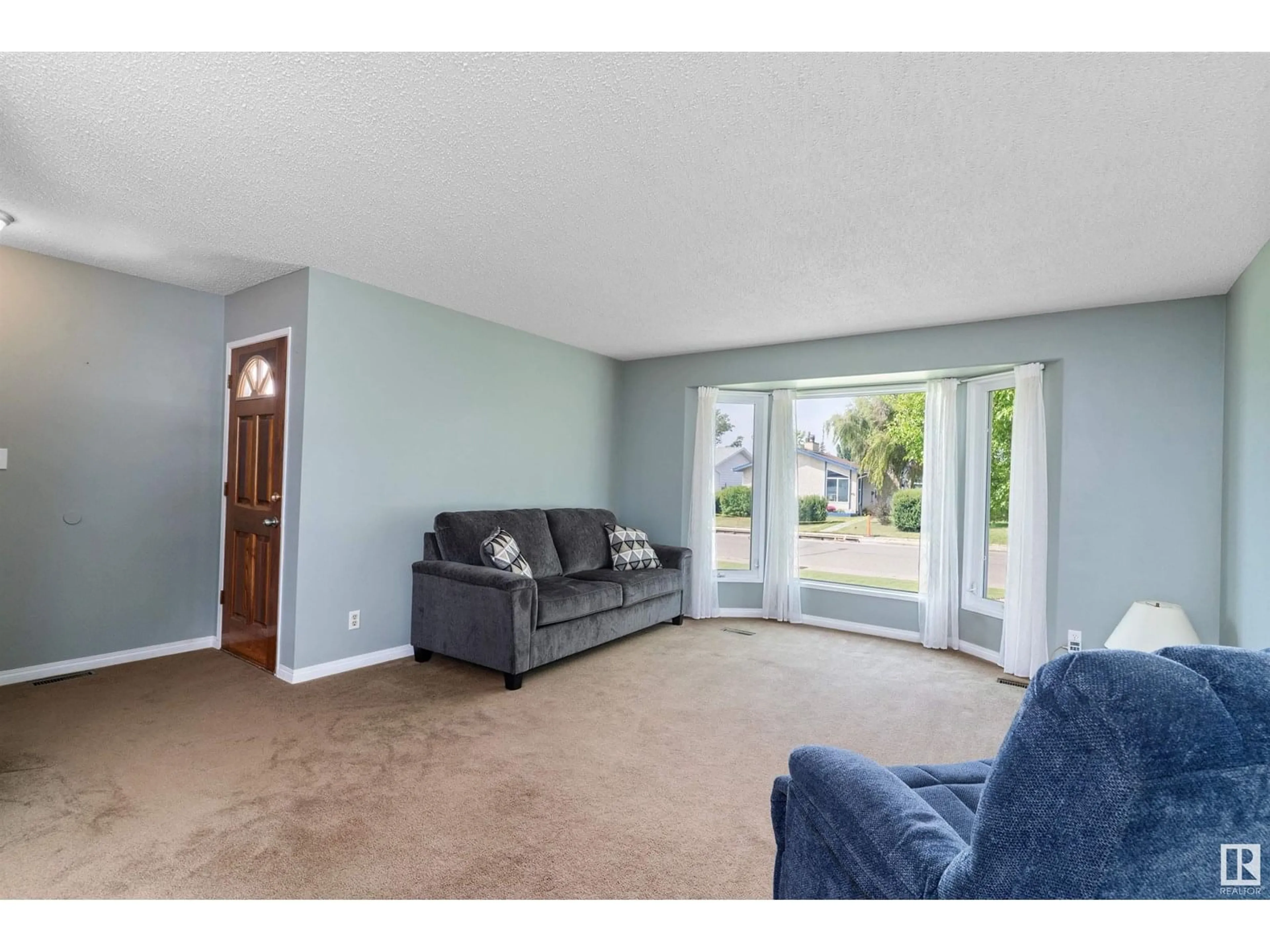 Living room with furniture, unknown for NW - 836 KNOTTWOOD RD S, Edmonton Alberta T6K2V2
