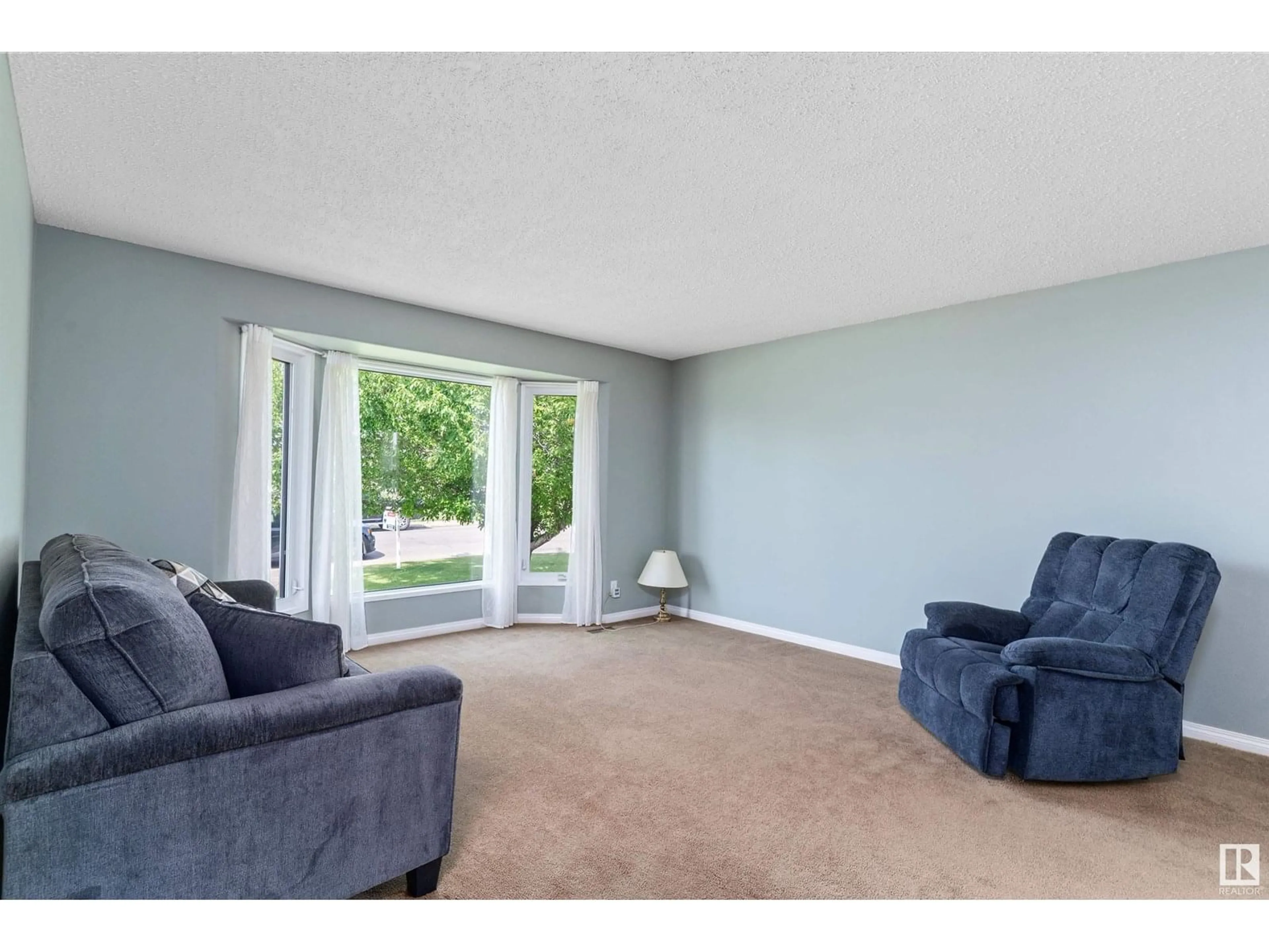 Living room with furniture, unknown for NW - 836 KNOTTWOOD RD S, Edmonton Alberta T6K2V2