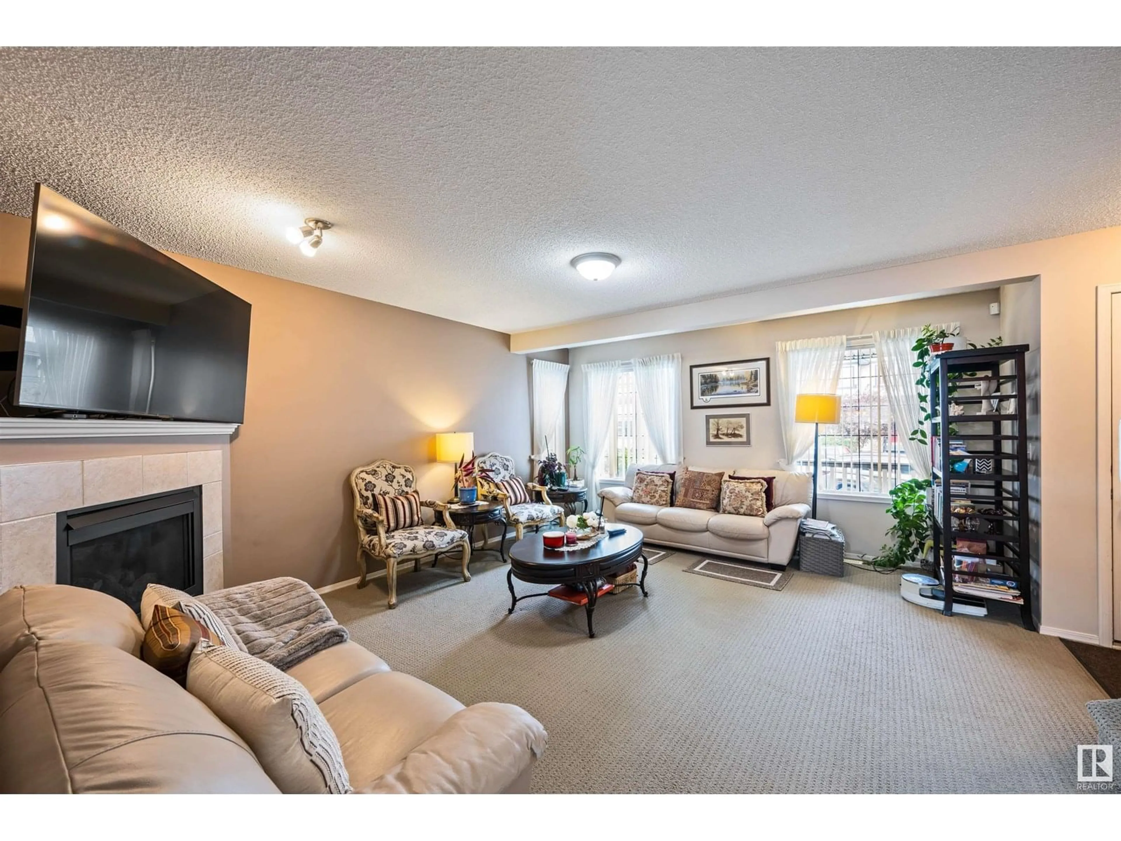 Living room with furniture, carpet floor for 9210 SCOTT LN, Edmonton Alberta T6R0E7