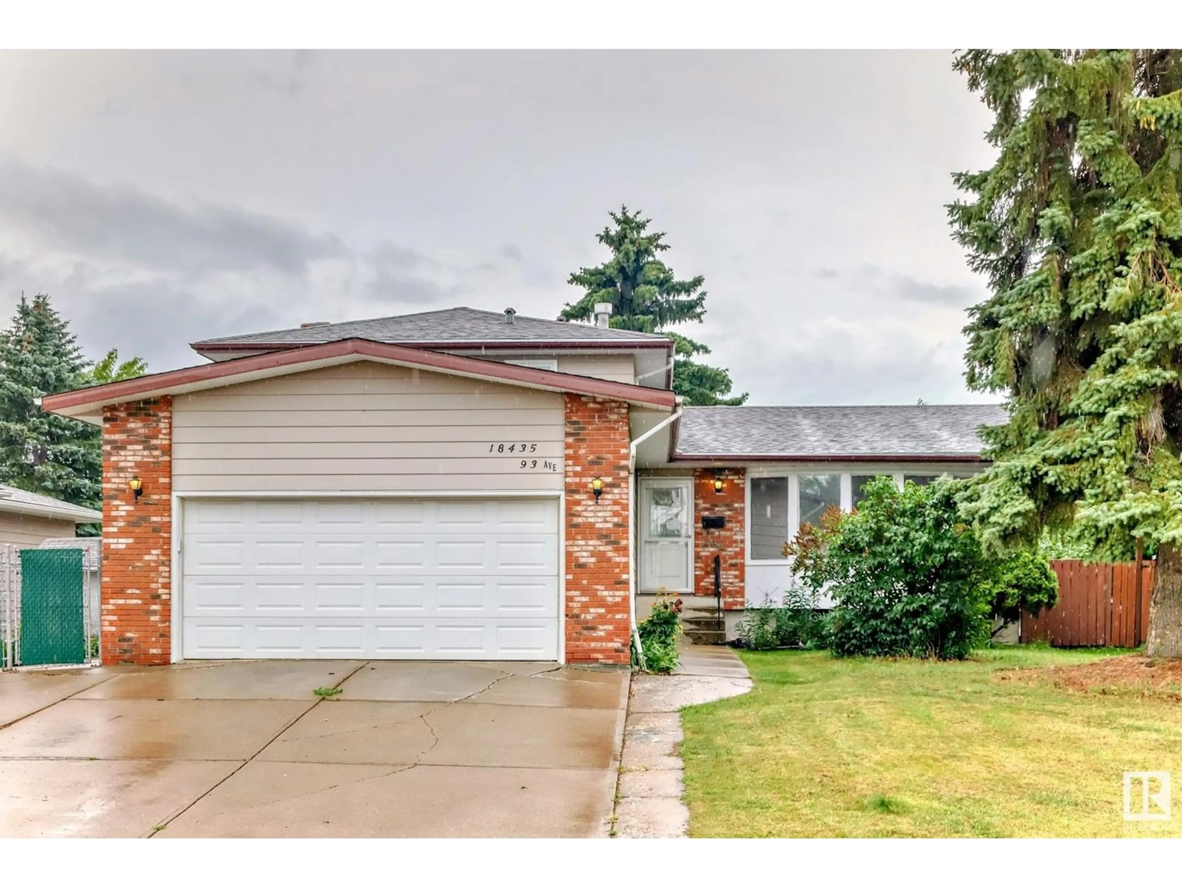 Home with brick exterior material, street for 18435 93 AV, Edmonton Alberta T5T1V5
