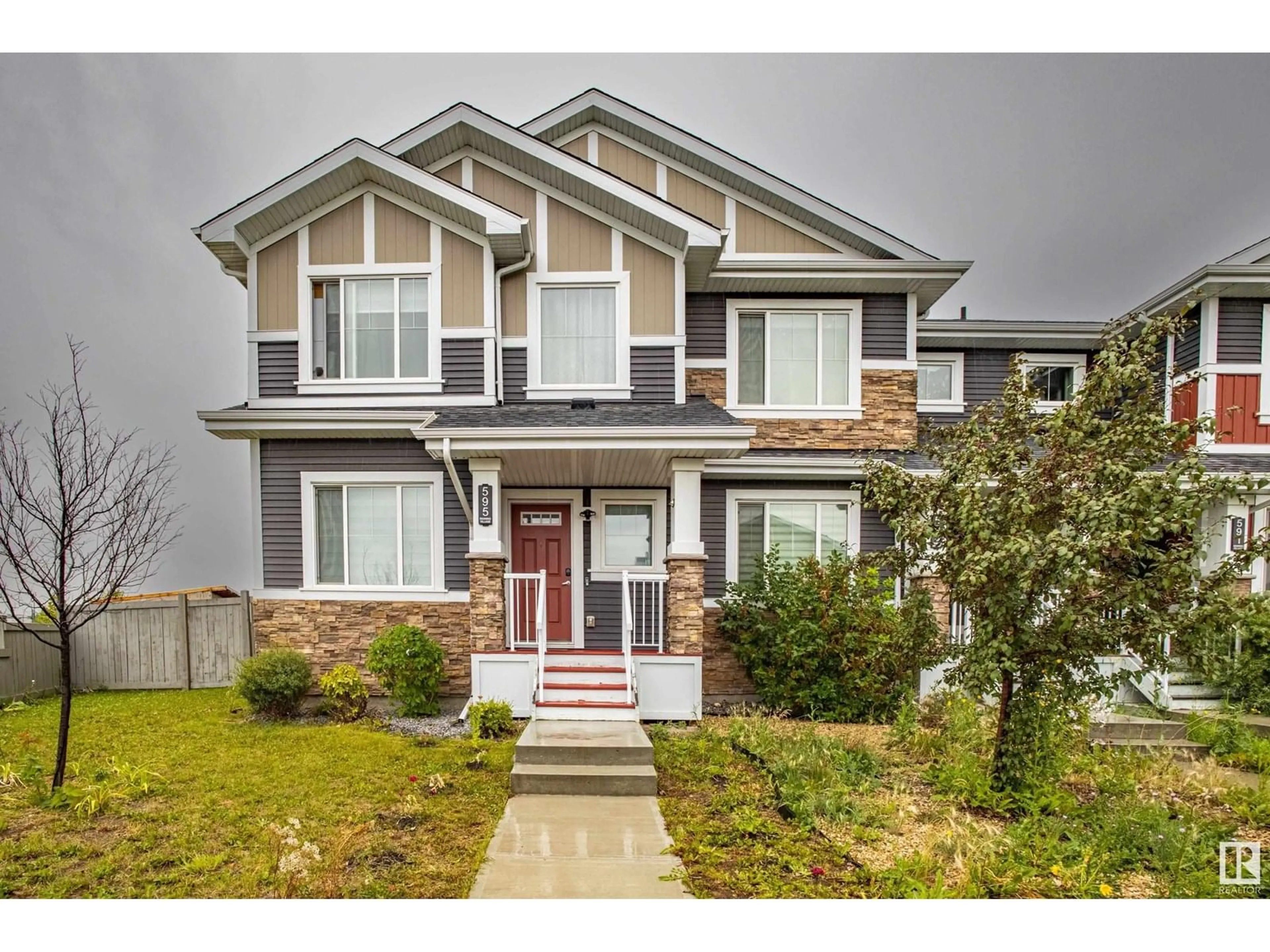 Home with brick exterior material, street for 595 EBBERS WY, Edmonton Alberta T5Y1R8