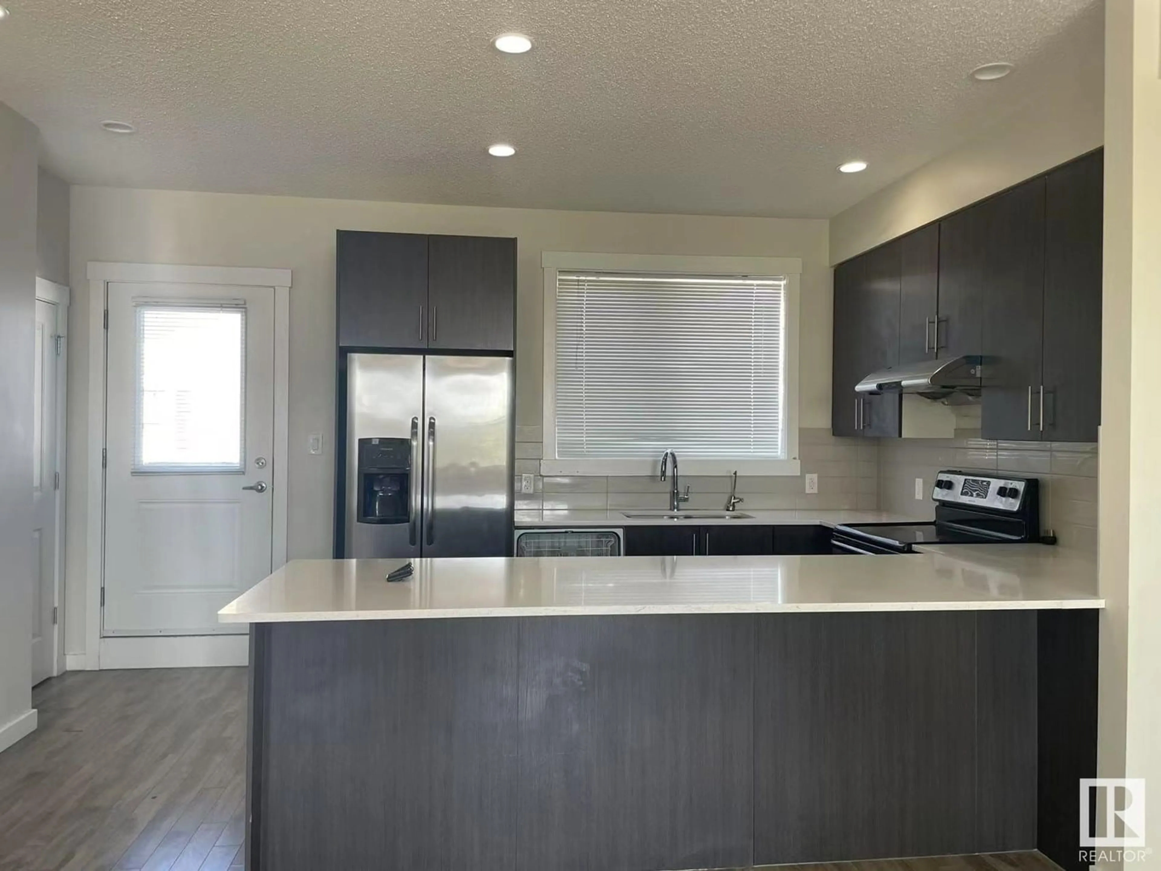 Open concept kitchen, ceramic/tile floor for 64 CRYSTALLINA NERA WAY, Edmonton Alberta T5Z0N6
