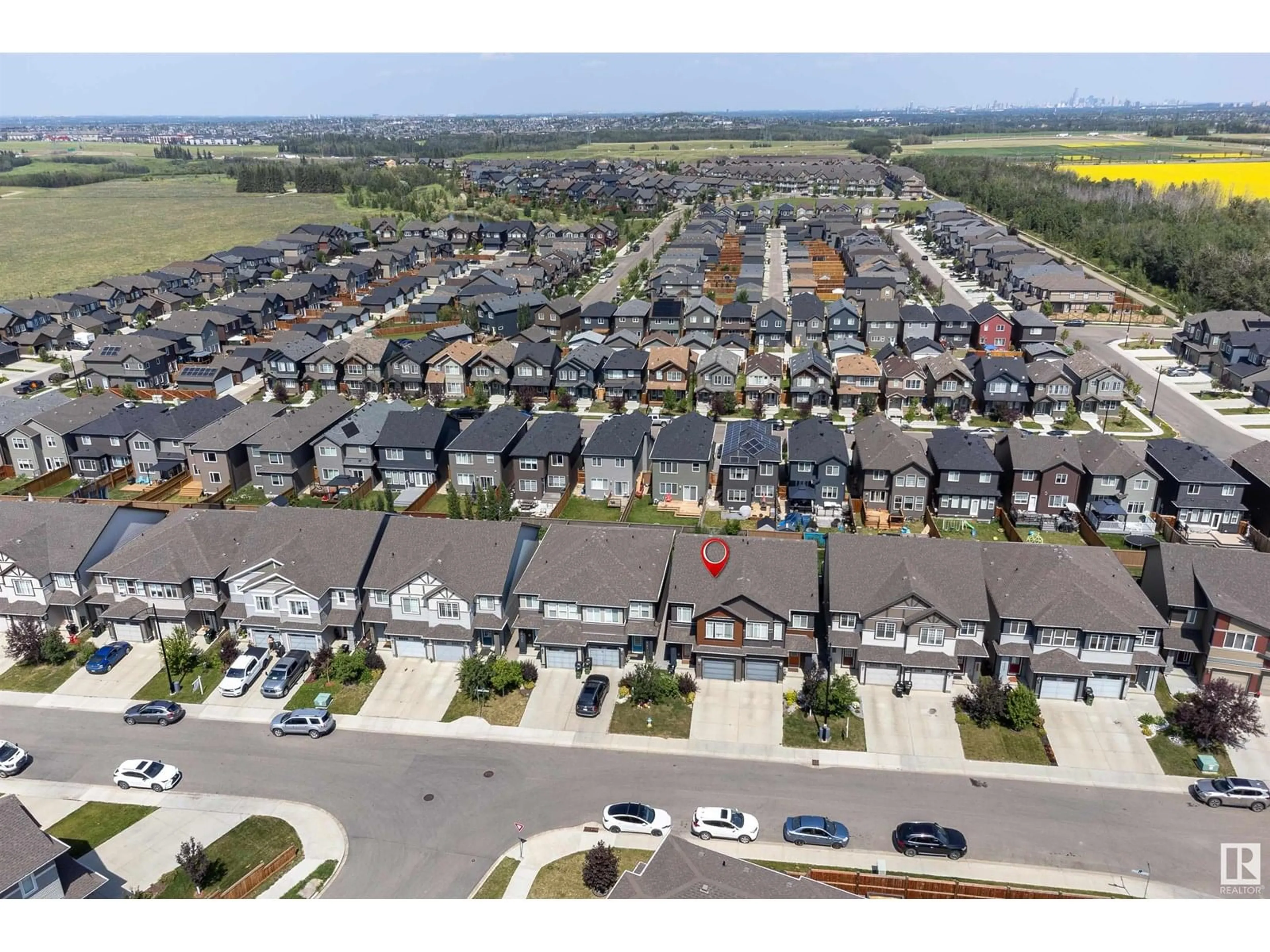A pic from outside/outdoor area/front of a property/back of a property/a pic from drone, street for 2104 PRICE LANDING SW, Edmonton Alberta T6W3W1