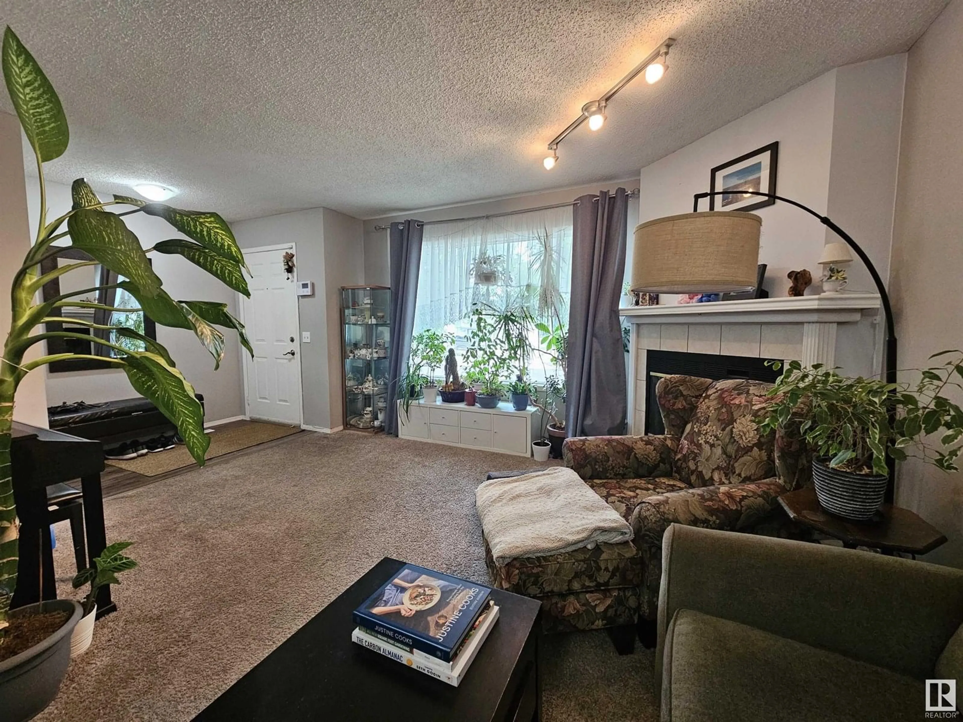 Living room with furniture, unknown for 11811 51 ST, Edmonton Alberta T5W3G3
