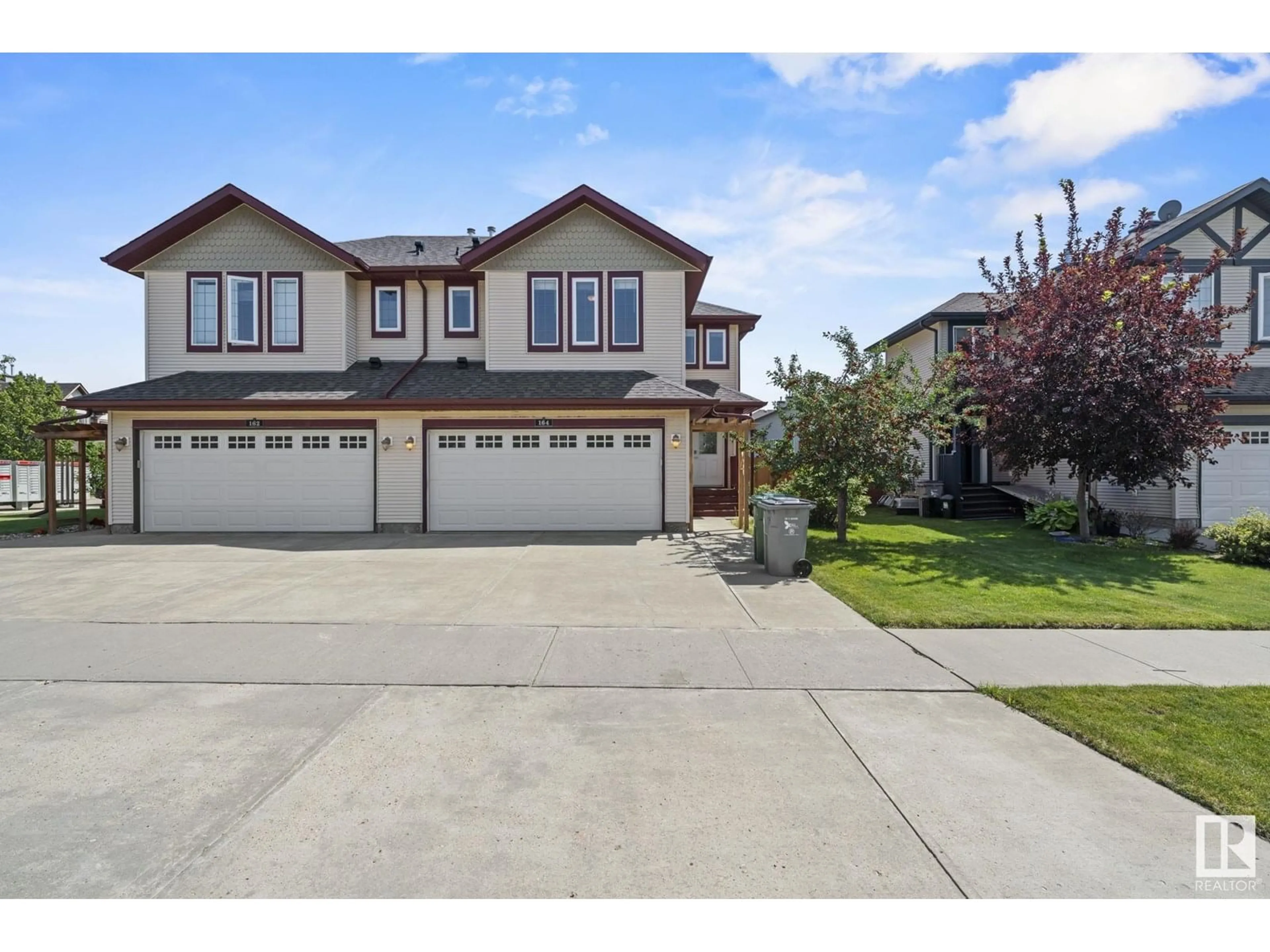 A pic from outside/outdoor area/front of a property/back of a property/a pic from drone, street for 164 RUE MAGNAN, Beaumont Alberta T4X0A6