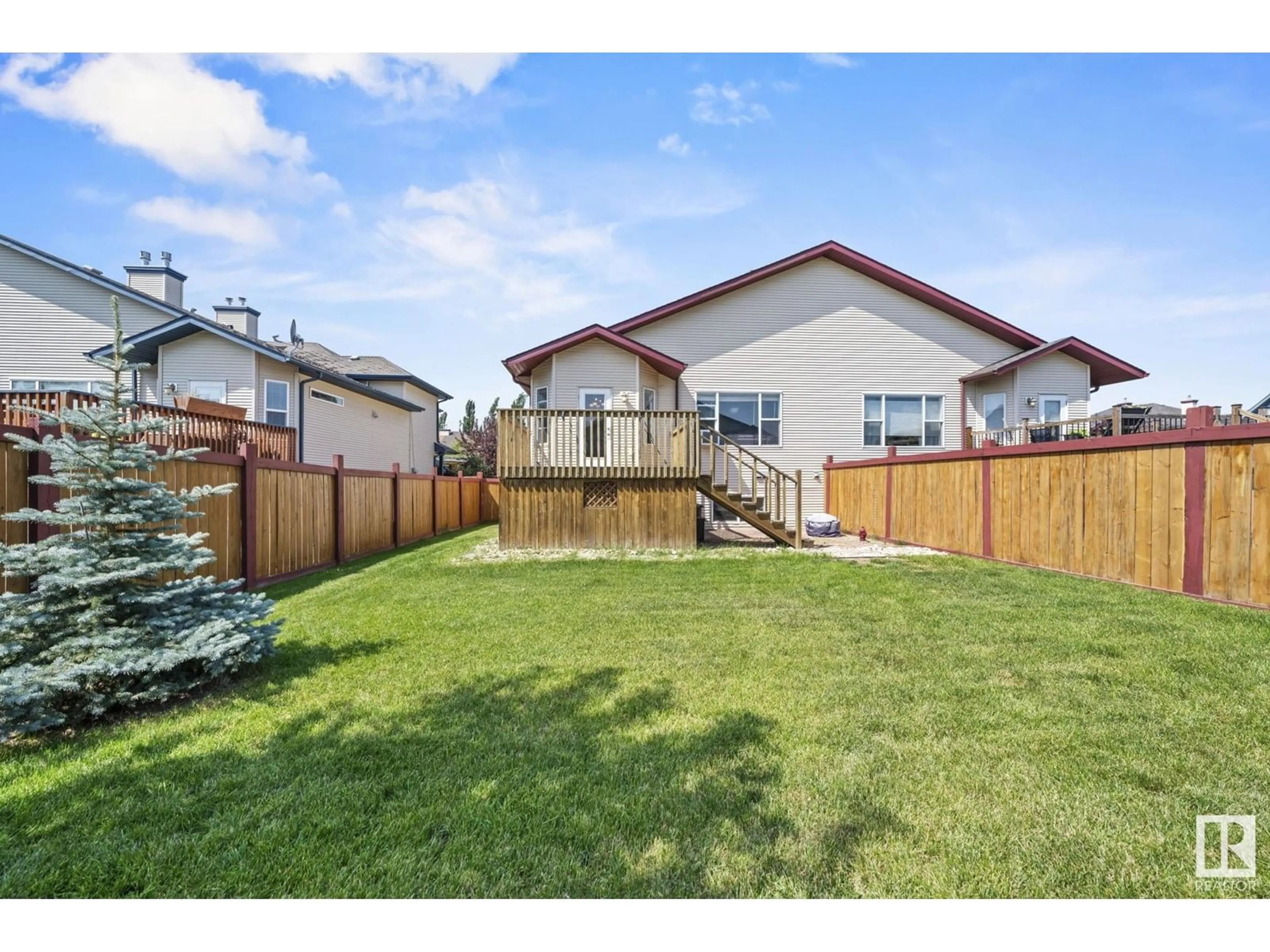 Home with vinyl exterior material, street for 164 RUE MAGNAN, Beaumont Alberta T4X0A6