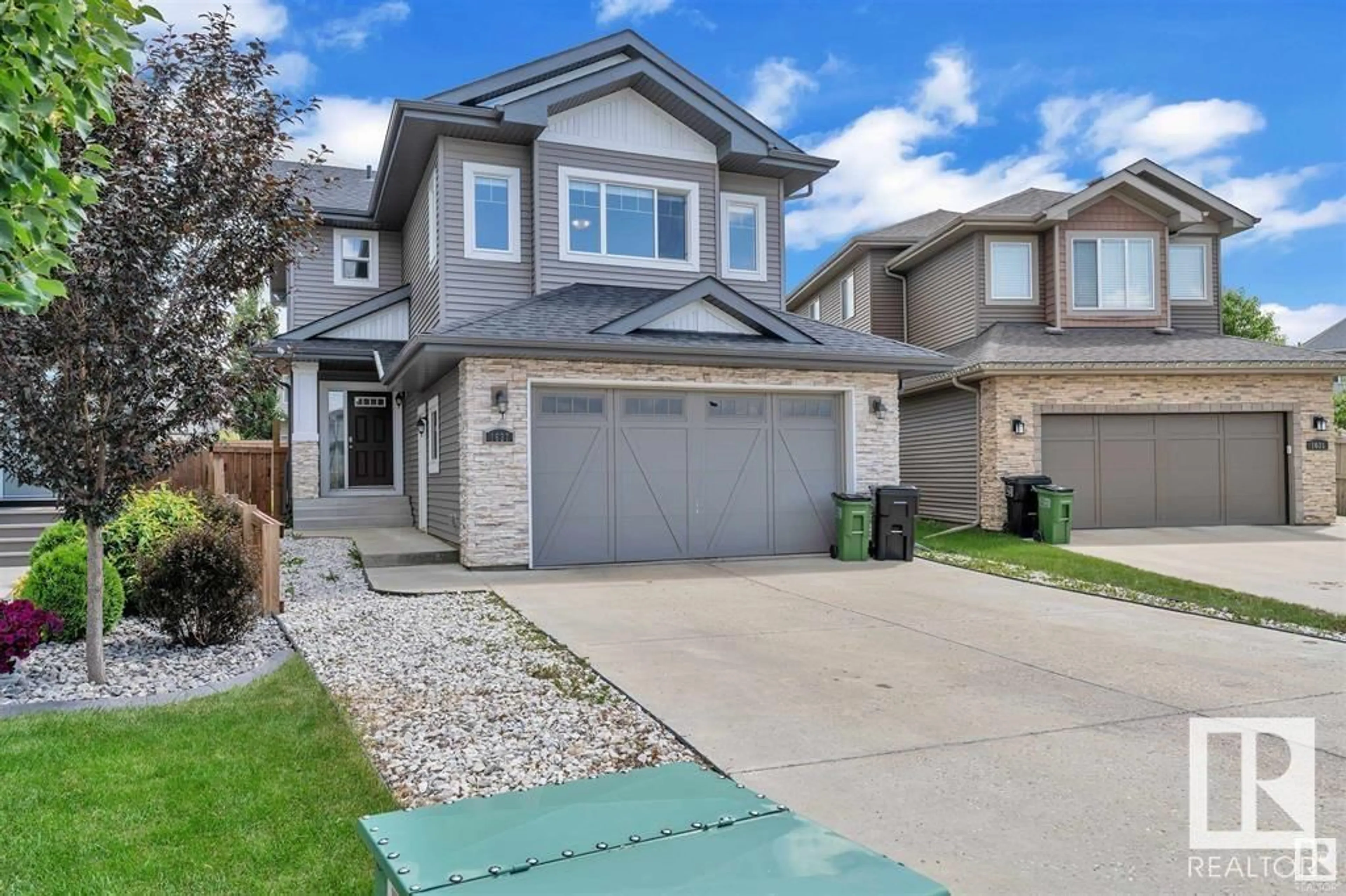 Home with vinyl exterior material, street for SW - 1627 161 ST, Edmonton Alberta T6W3P4