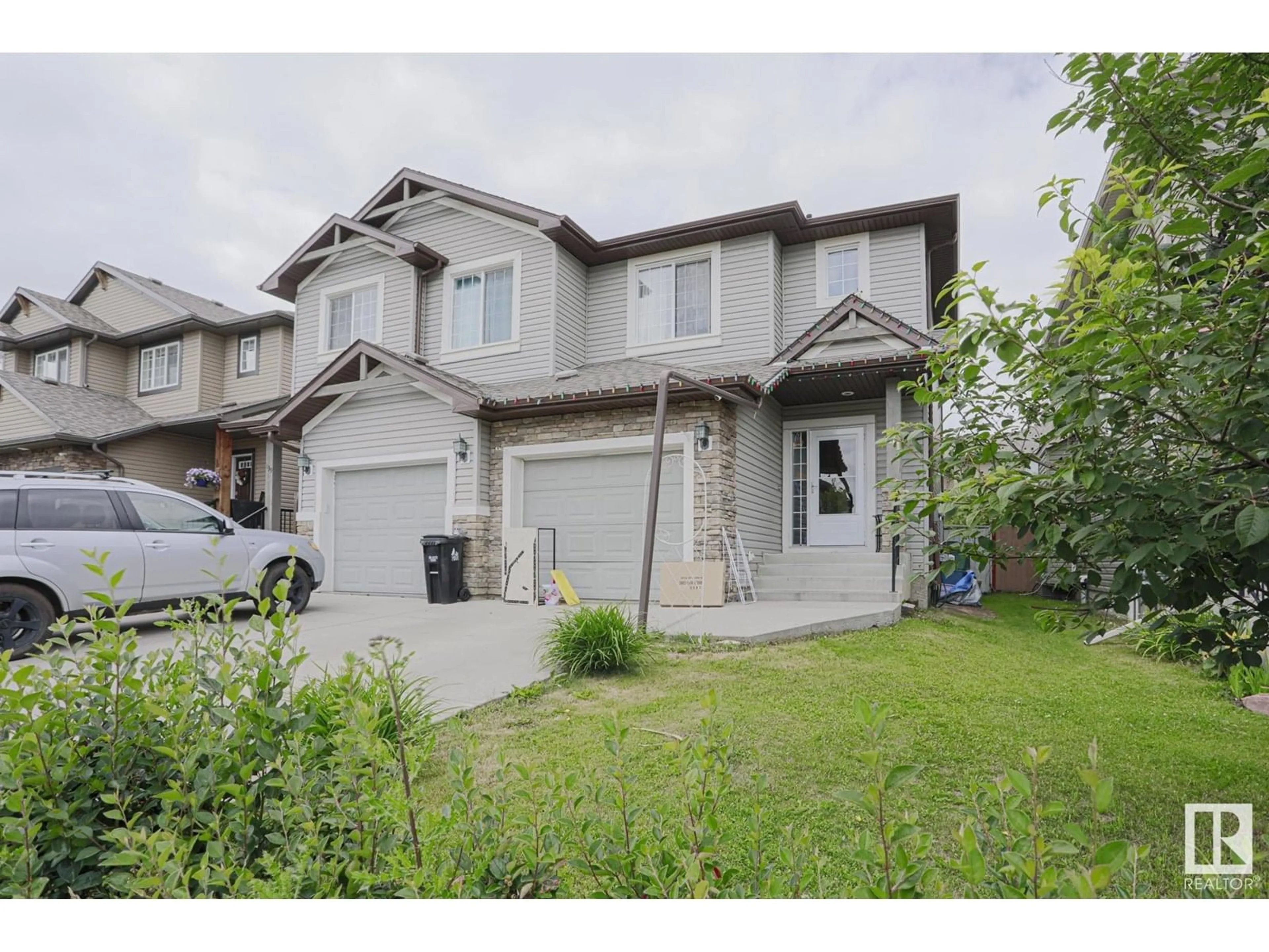 A pic from outside/outdoor area/front of a property/back of a property/a pic from drone, street for 141 MCLAUGHLIN DR, Spruce Grove Alberta T7X0A6