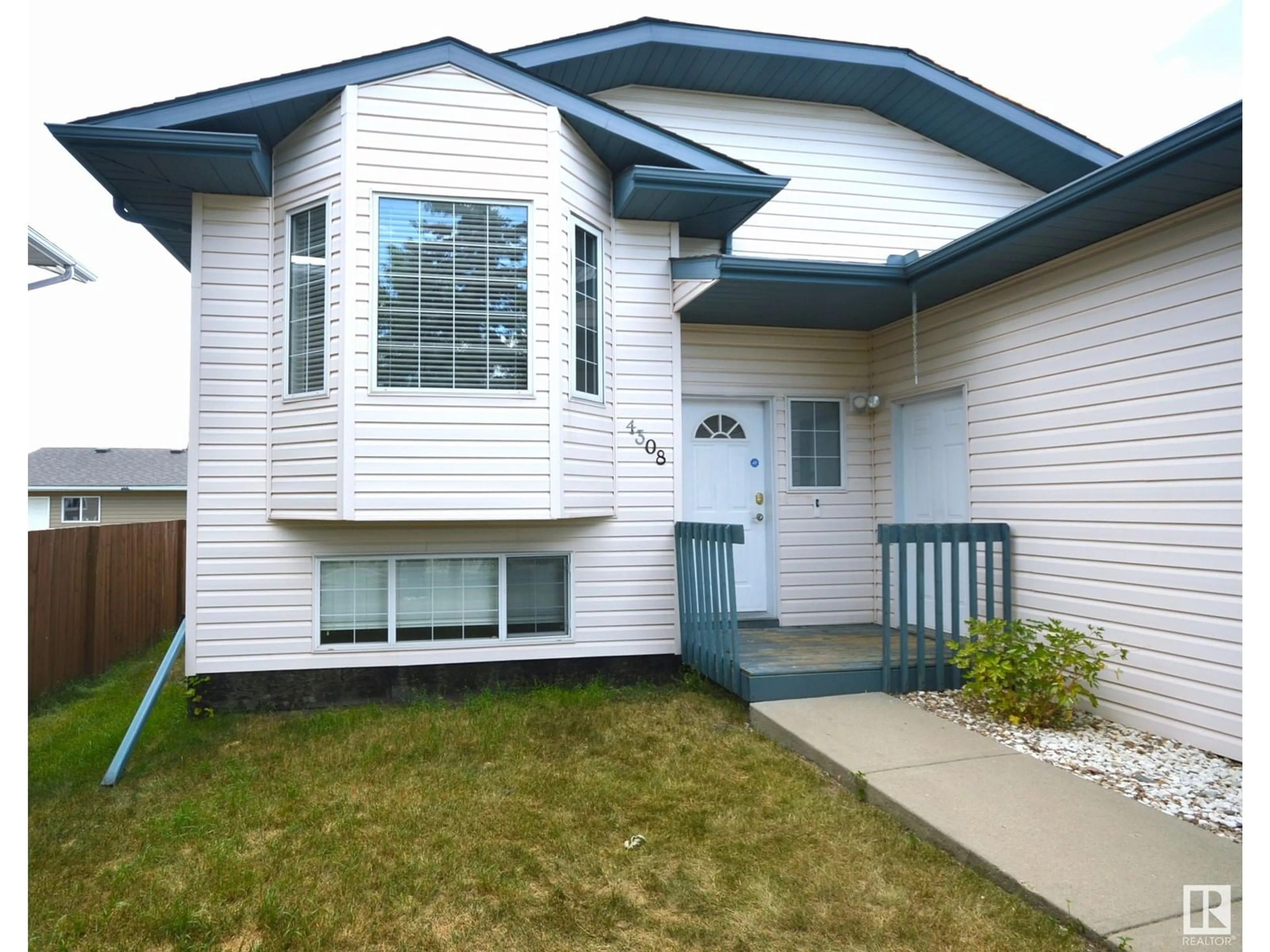 Home with vinyl exterior material, street for 4308 39 ST, Bonnyville Town Alberta T9N2K1