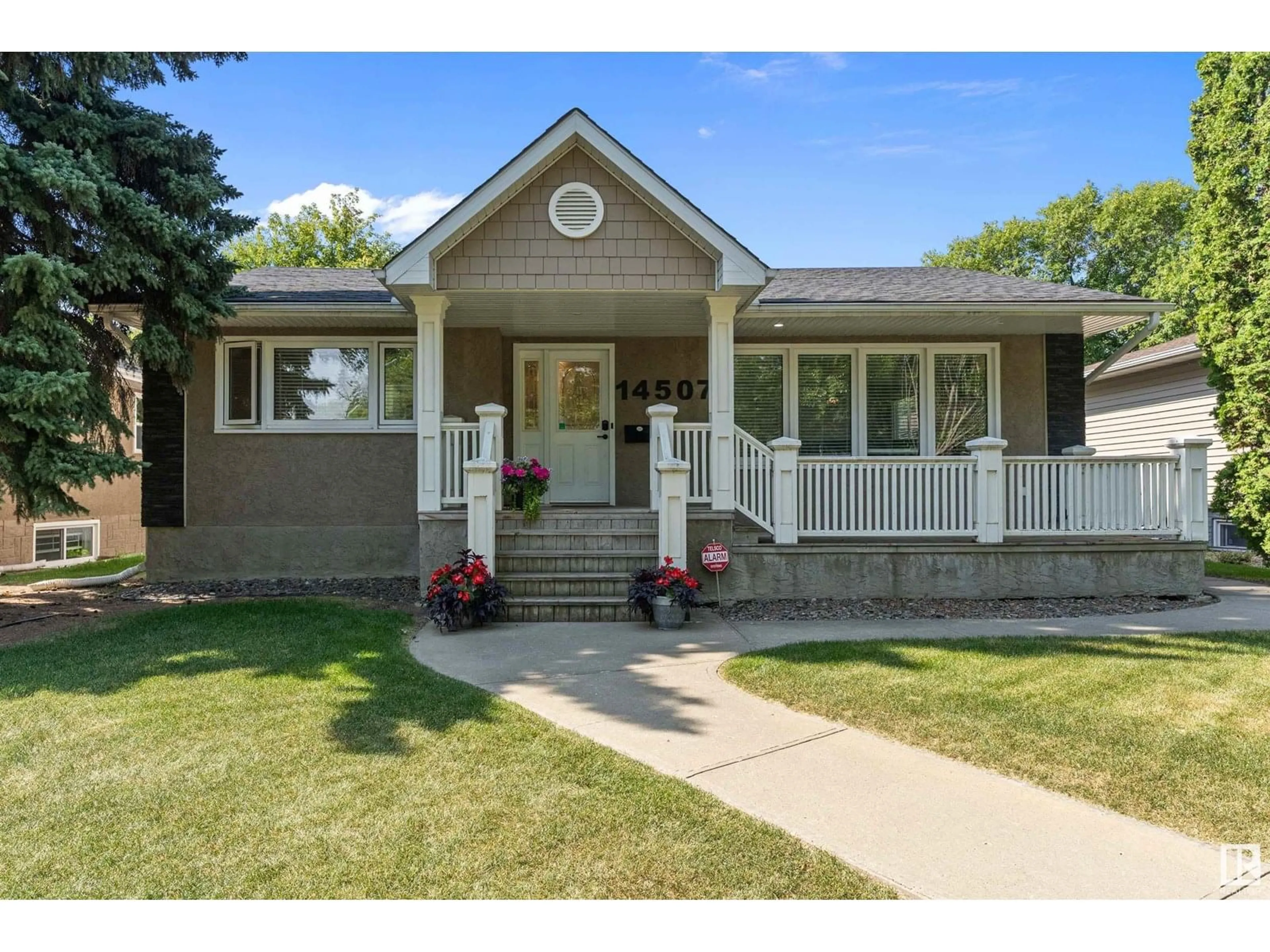 Home with vinyl exterior material, street for 14507 98 AVE NW, Edmonton Alberta T5N0G9
