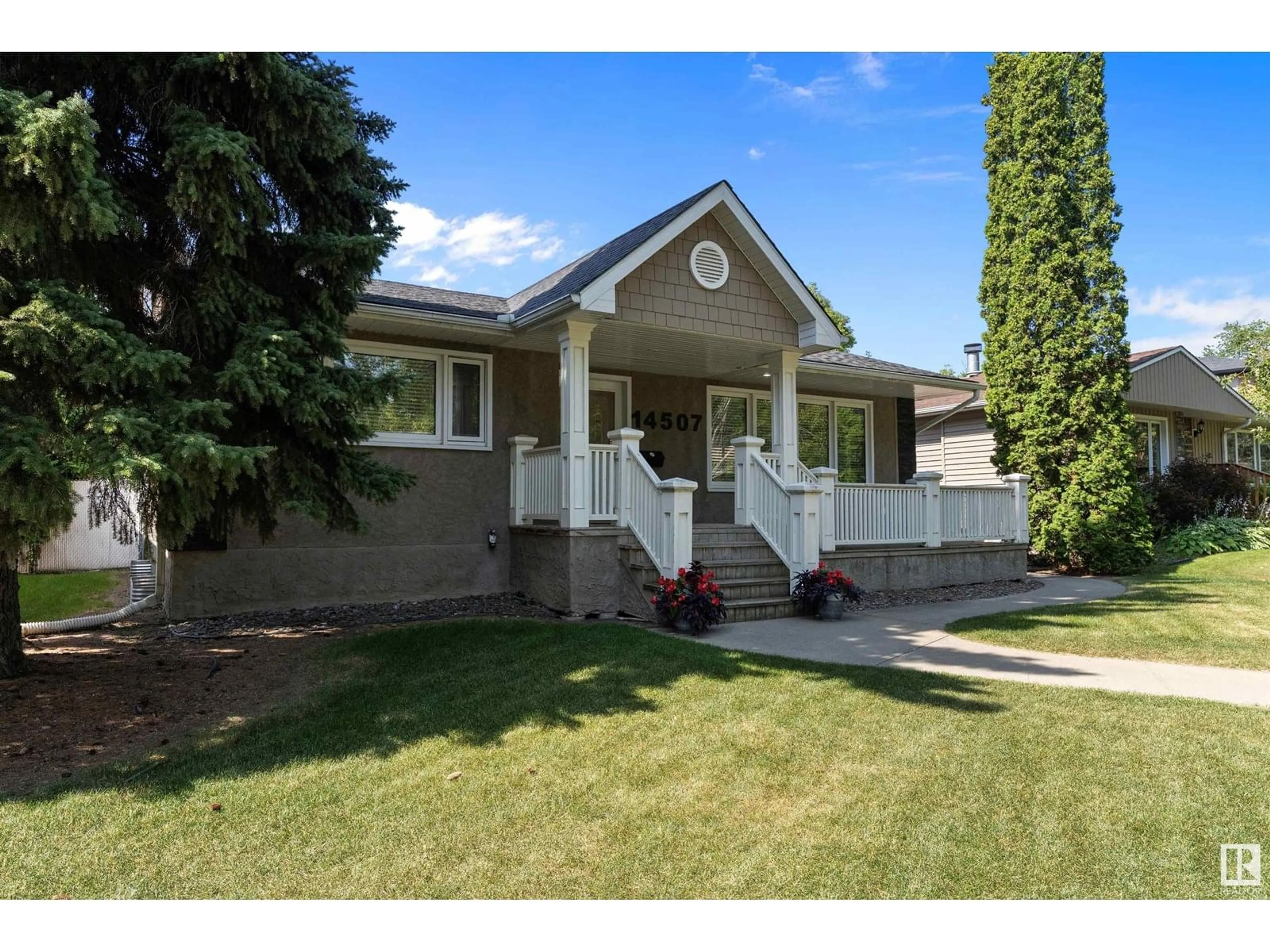 Home with vinyl exterior material, street for 14507 98 AVE NW, Edmonton Alberta T5N0G9