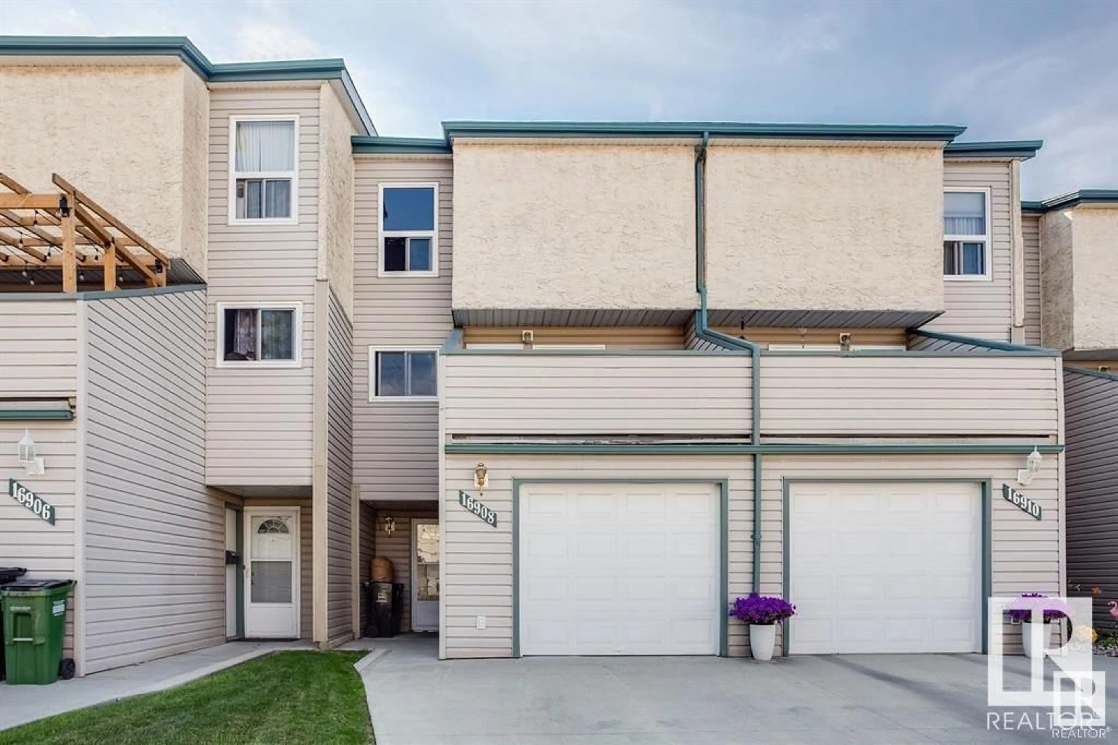 Home with vinyl exterior material, street for NW - 16908 109 ST, Edmonton Alberta T5X2J3