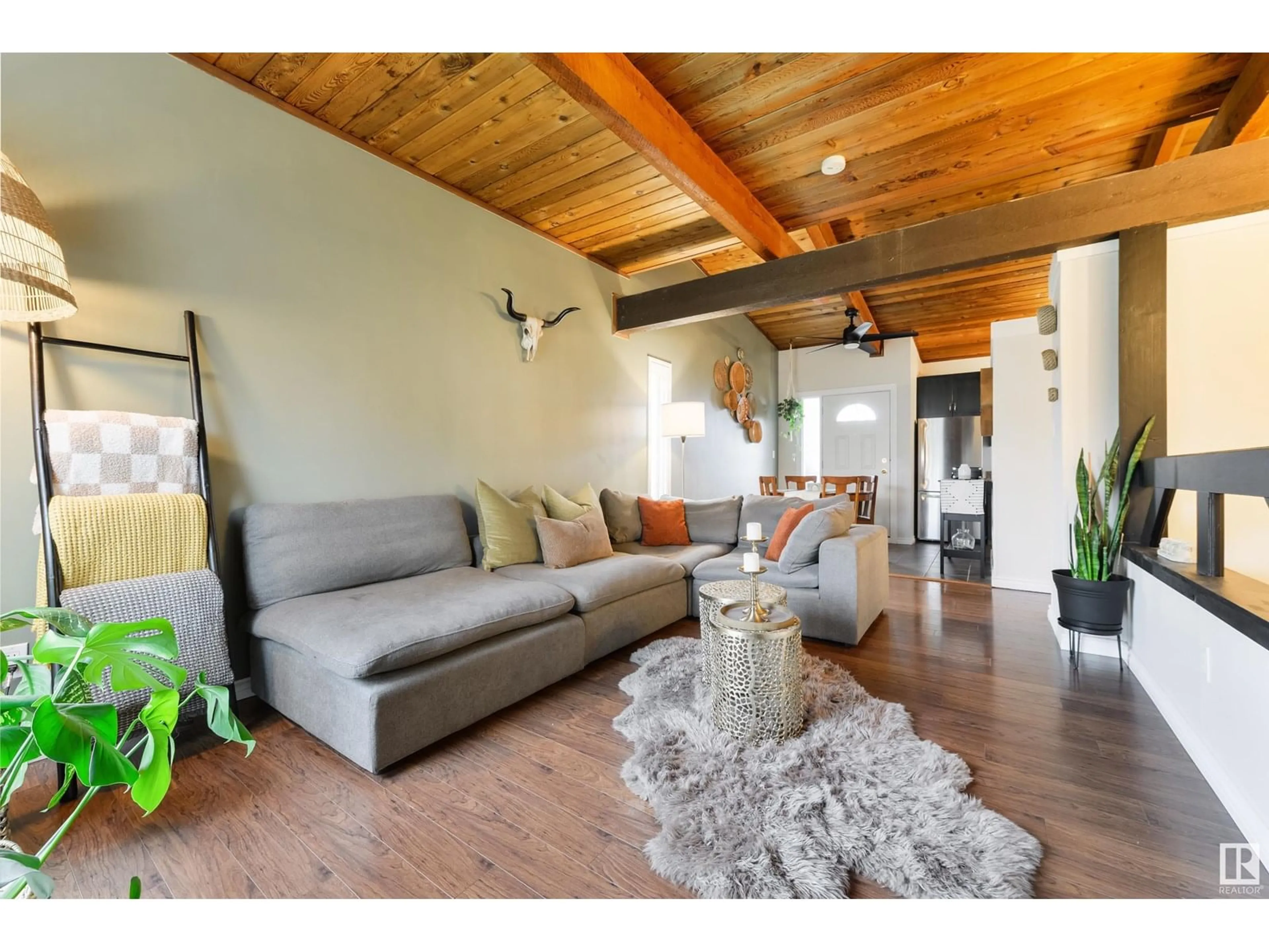 Living room with furniture, wood/laminate floor for 67 NORTHWOODS VG, Edmonton Alberta T5X1T2