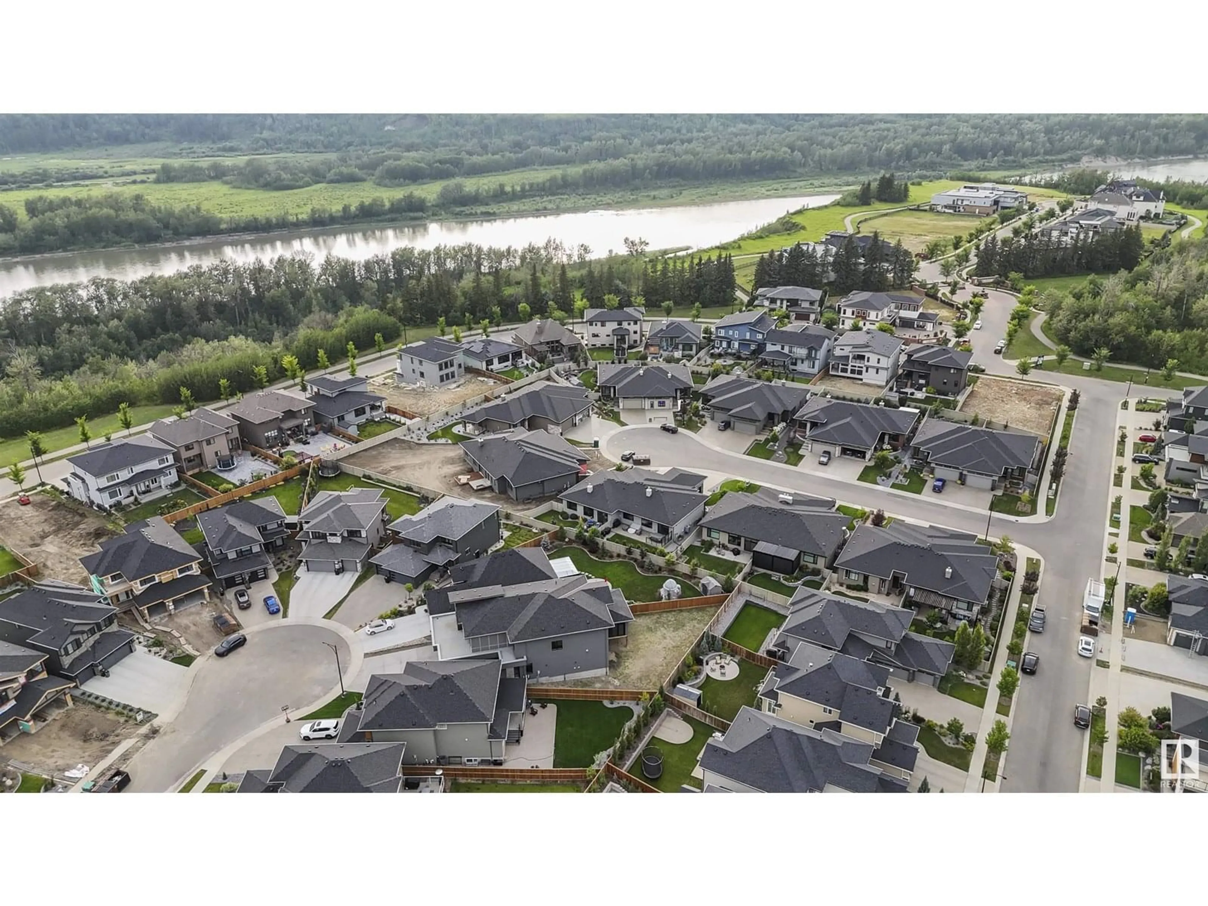A pic from outside/outdoor area/front of a property/back of a property/a pic from drone, water/lake/river/ocean view for 4712 KNIGHT CL, Edmonton Alberta T6W4V6