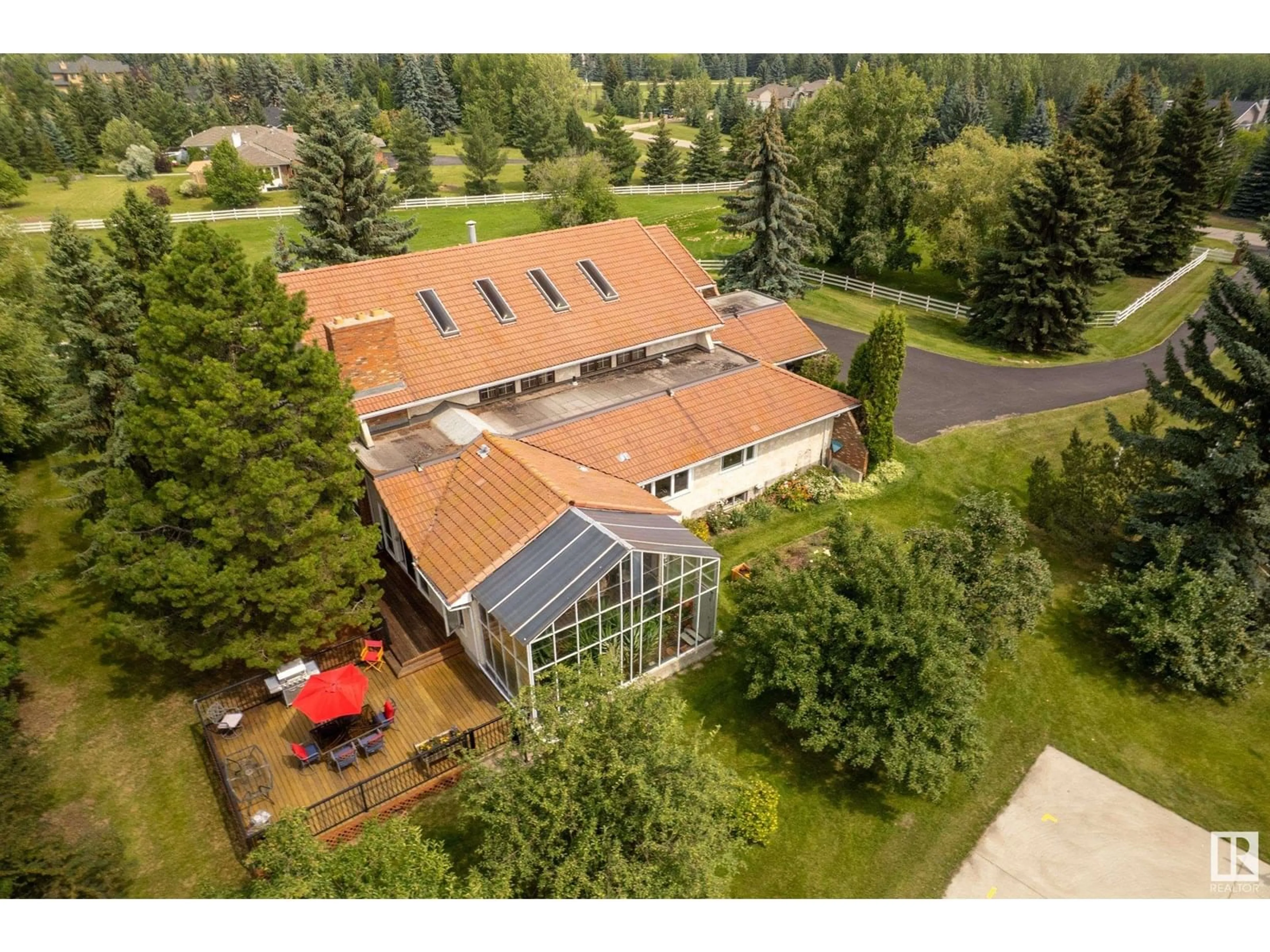 A pic from outside/outdoor area/front of a property/back of a property/a pic from drone, building for 122 52319 RGE ROAD 231, Rural Strathcona County Alberta T8B1A8