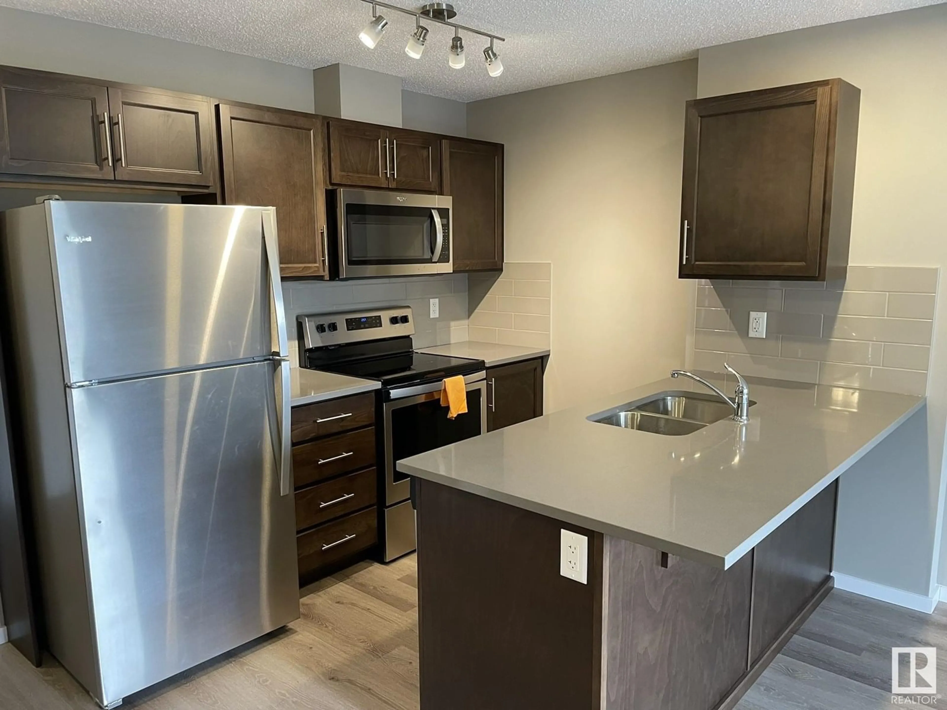 Standard kitchen, unknown for #223 - 148 EBBERS BV, Edmonton Alberta T5Y3W2
